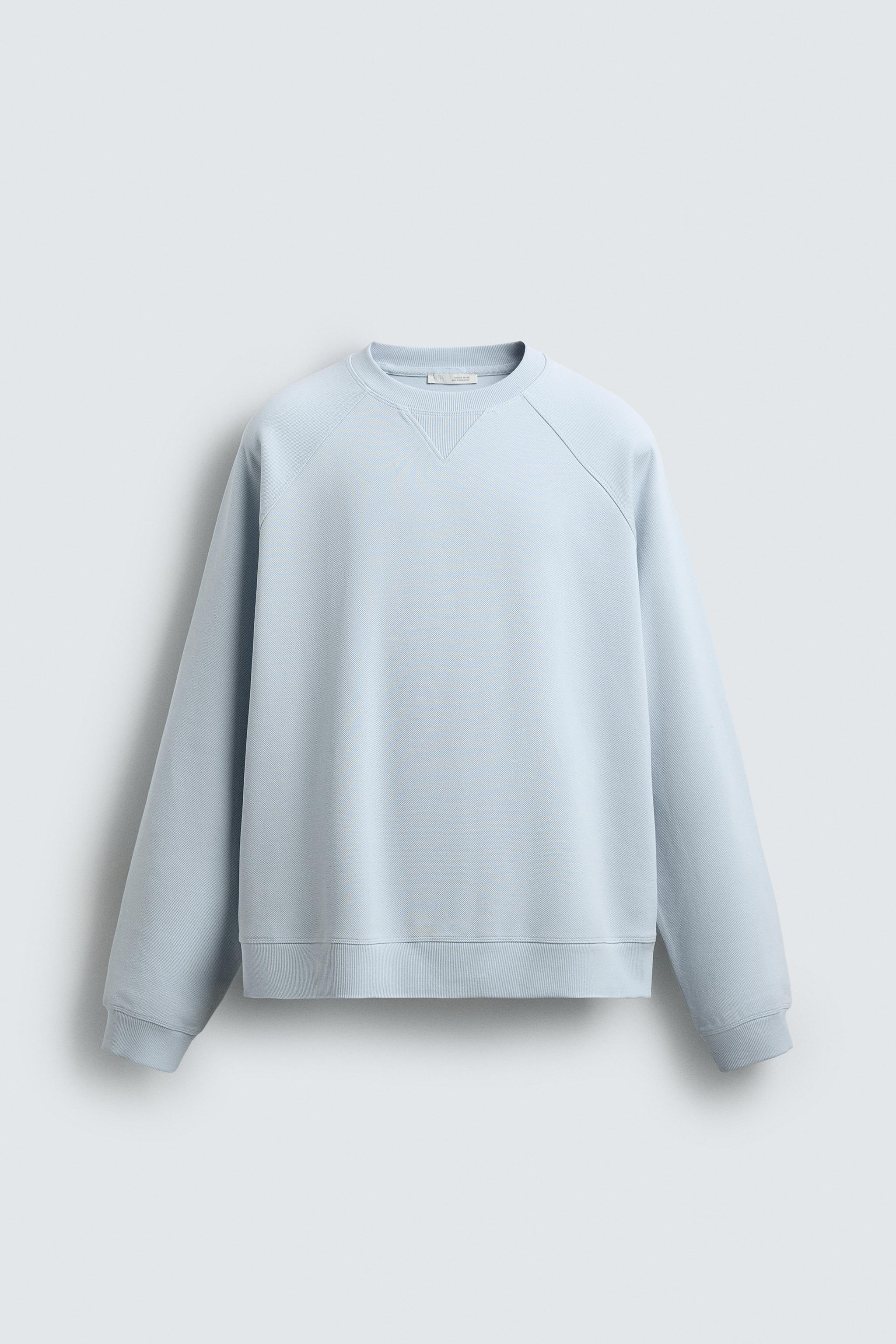 SWEAT DÉLAVÉ STRUCTURE PIQUÉ