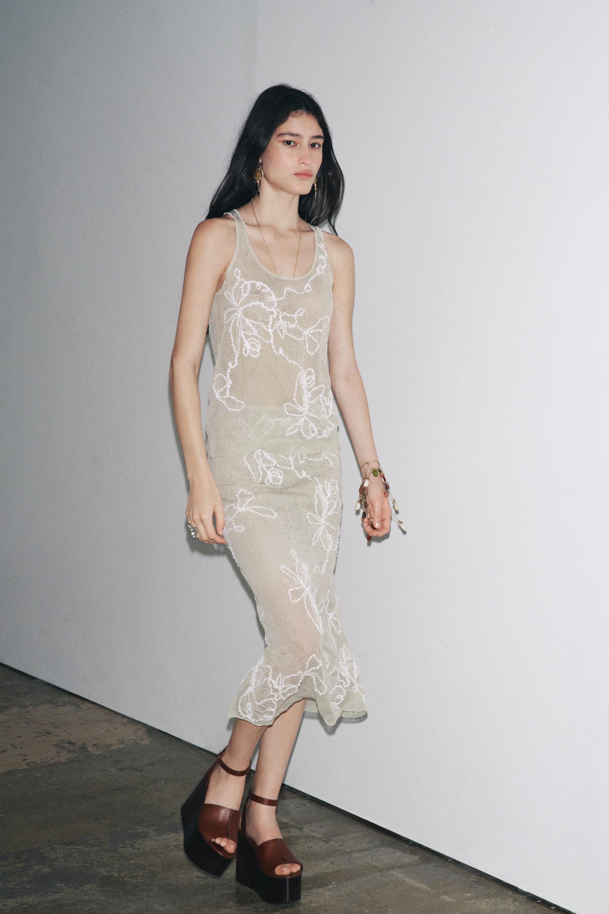 TOP SEMI-TRANSPARENT EN MAILLE TEXTURÉE