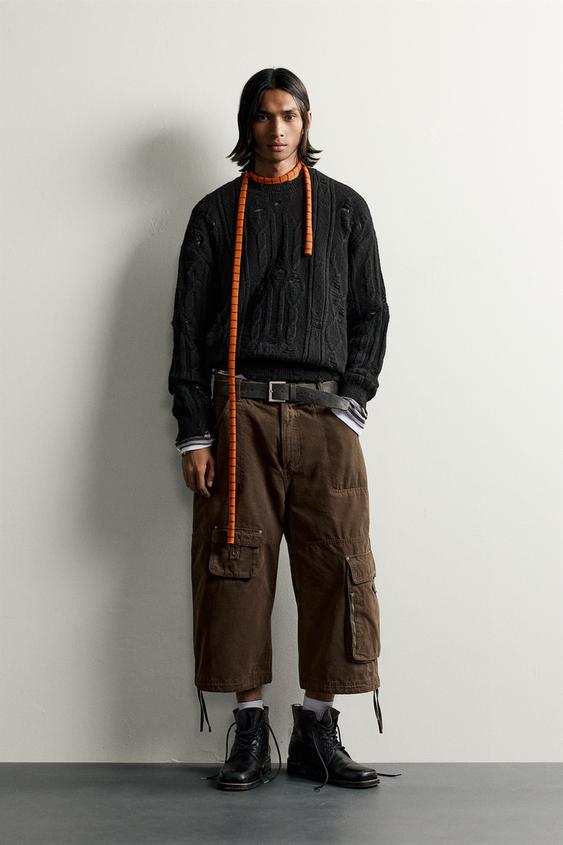 PULLOVER MIT ZOPFMUSTER UND LÖCHERN - Schwarz von Zara - Bild 0