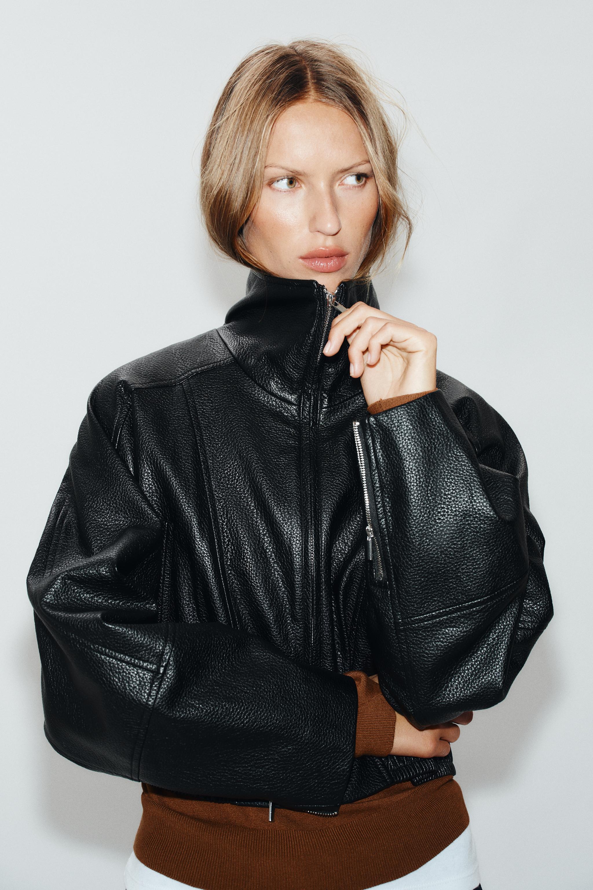 BLOUSON COURT EN MATIÈRE SYNTHÉTIQUE