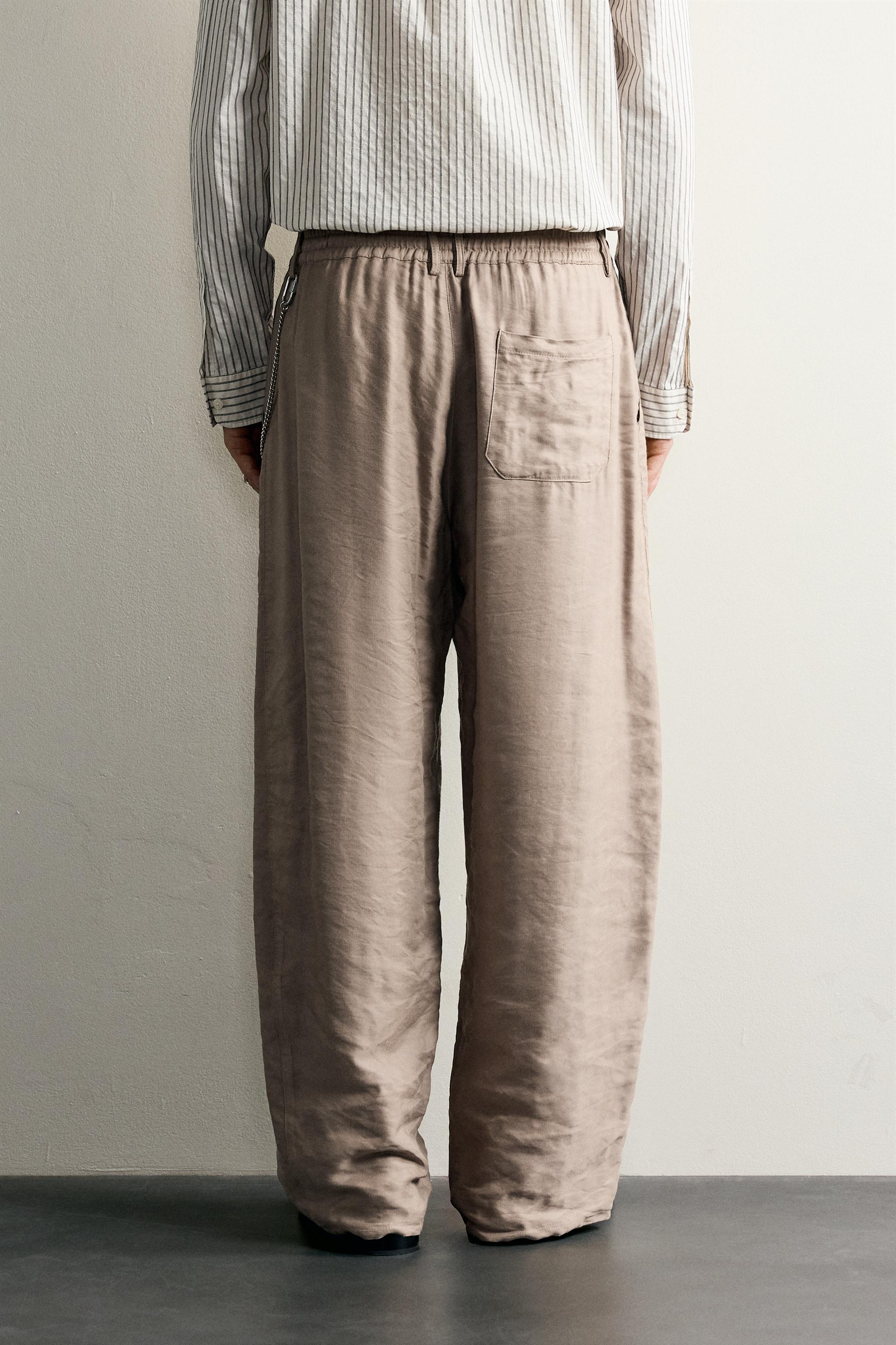 RELAXED FIT FLOWY PANTS