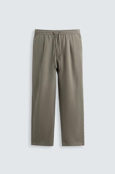 RELAXED FIT FLOWING TROUSERS - Light khaki by Zara