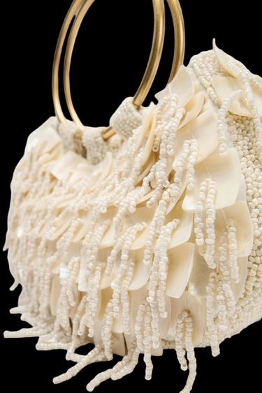 BOLSO DE MANO EFECTO NACARADO - blanco de Zara