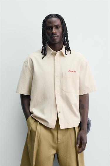 CHECK SHIRT WITH EMBROIDERED SLOGAN - Ecru by Zara