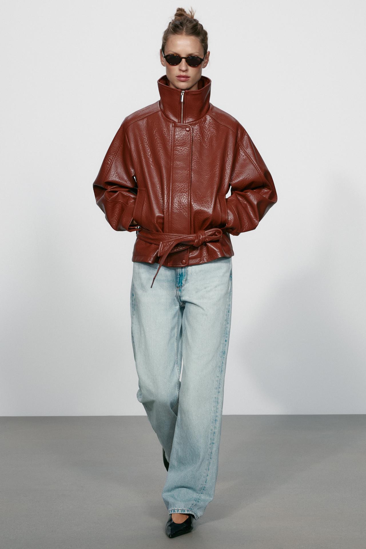 LEATHER EFFECT BELTED JACKET
