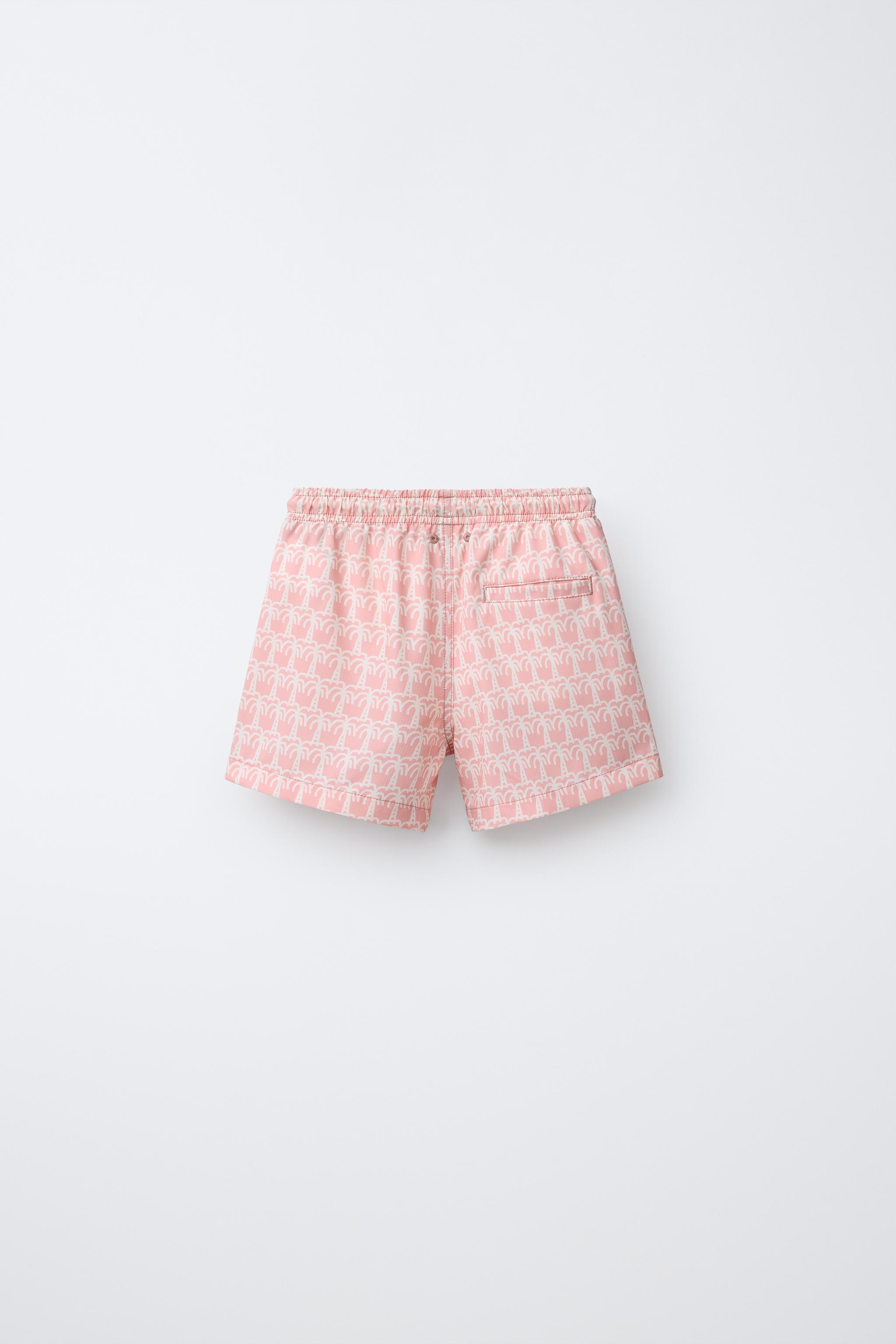 AGES 6-14 / PALM TREE SWIM SHORTS