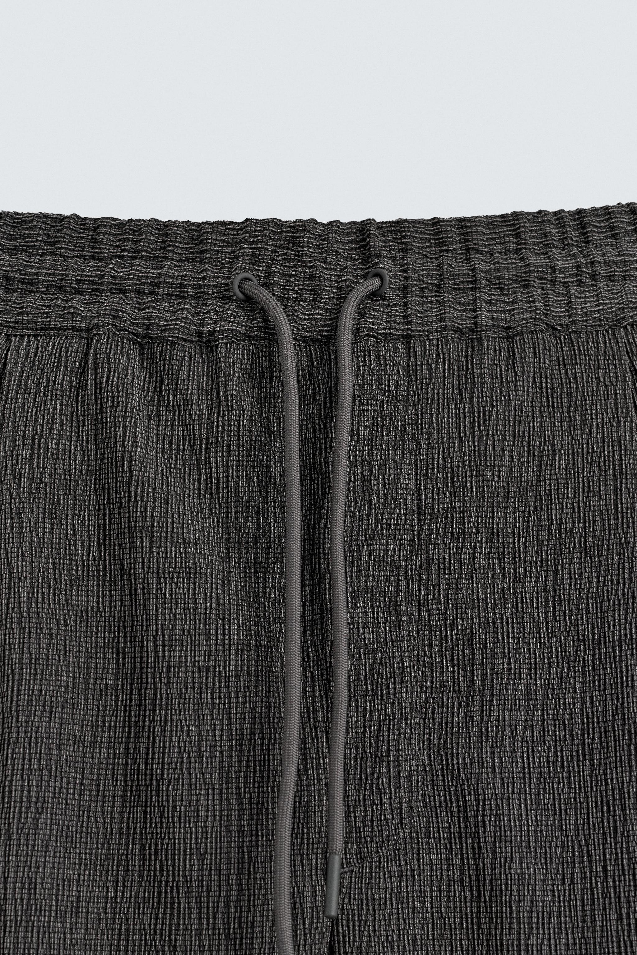 RELAXED FIT EMBOSSED SHORTS