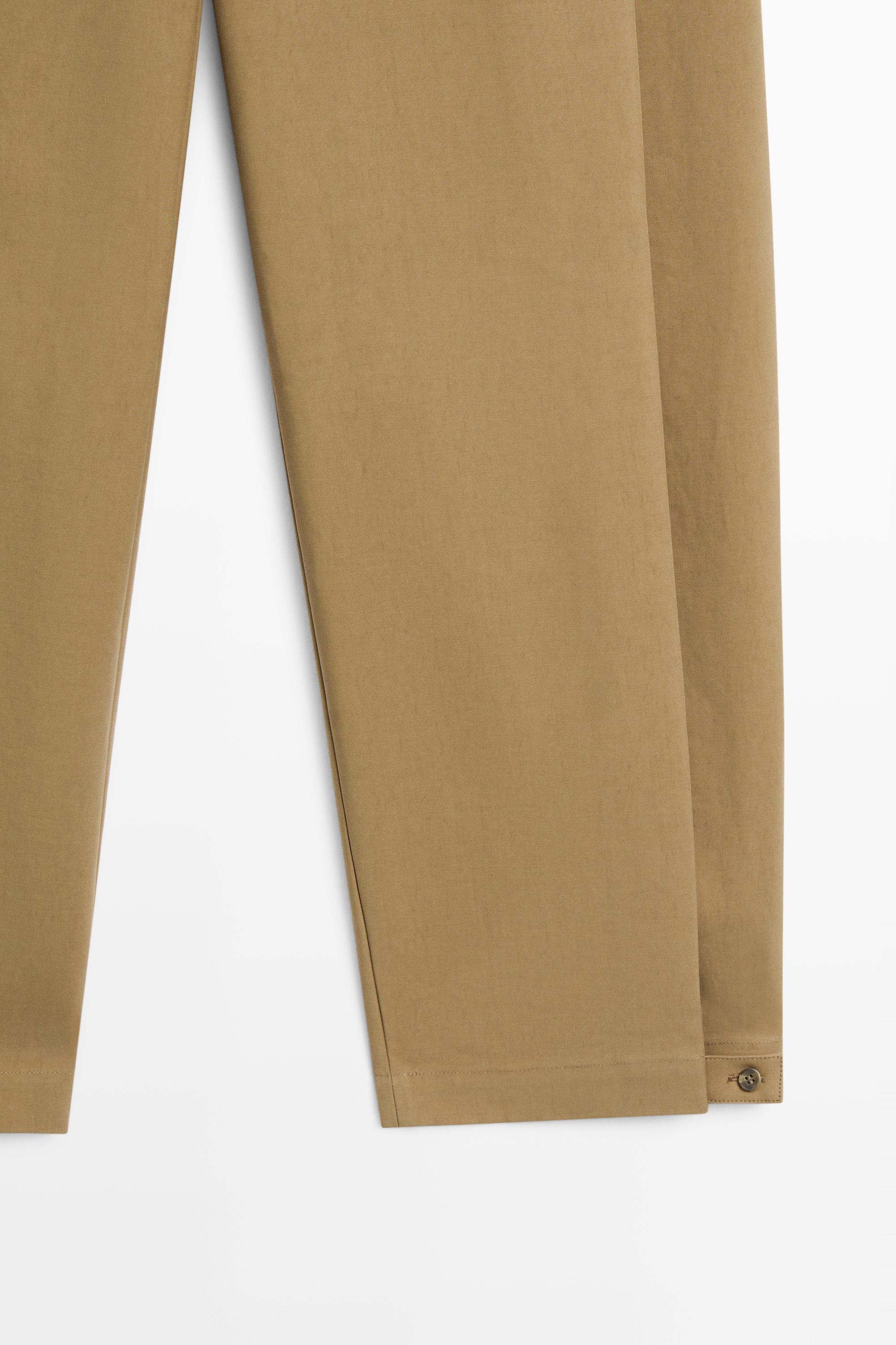 Pantalon barrel fit à plis latéraux