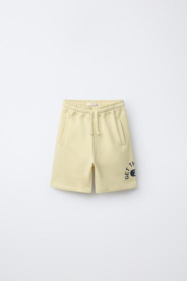 JOGGING BERMUDA SHORTS WITH SLOGAN - Yellow by Zara