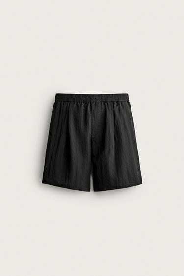 SPLÝVAVÉ BERMUDY RELAXED FIT SE ZÁŠEVEK - Černá od Zara