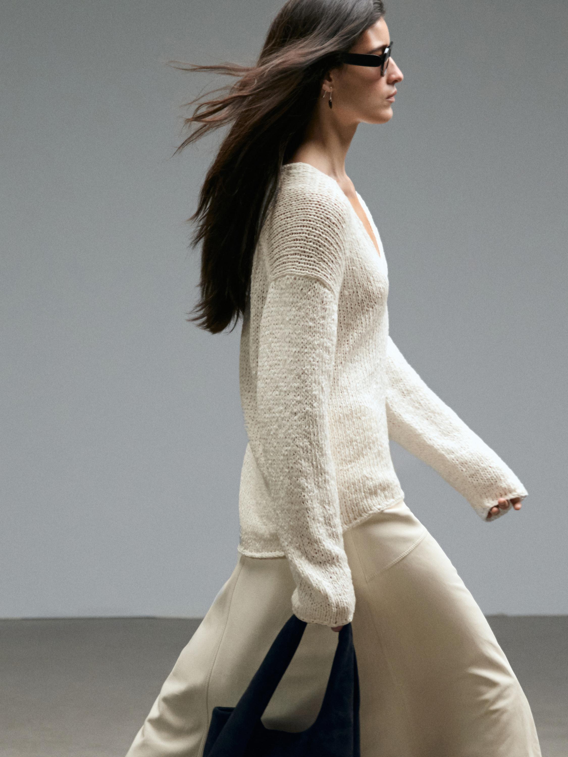 Pull en maille ajourée à col V