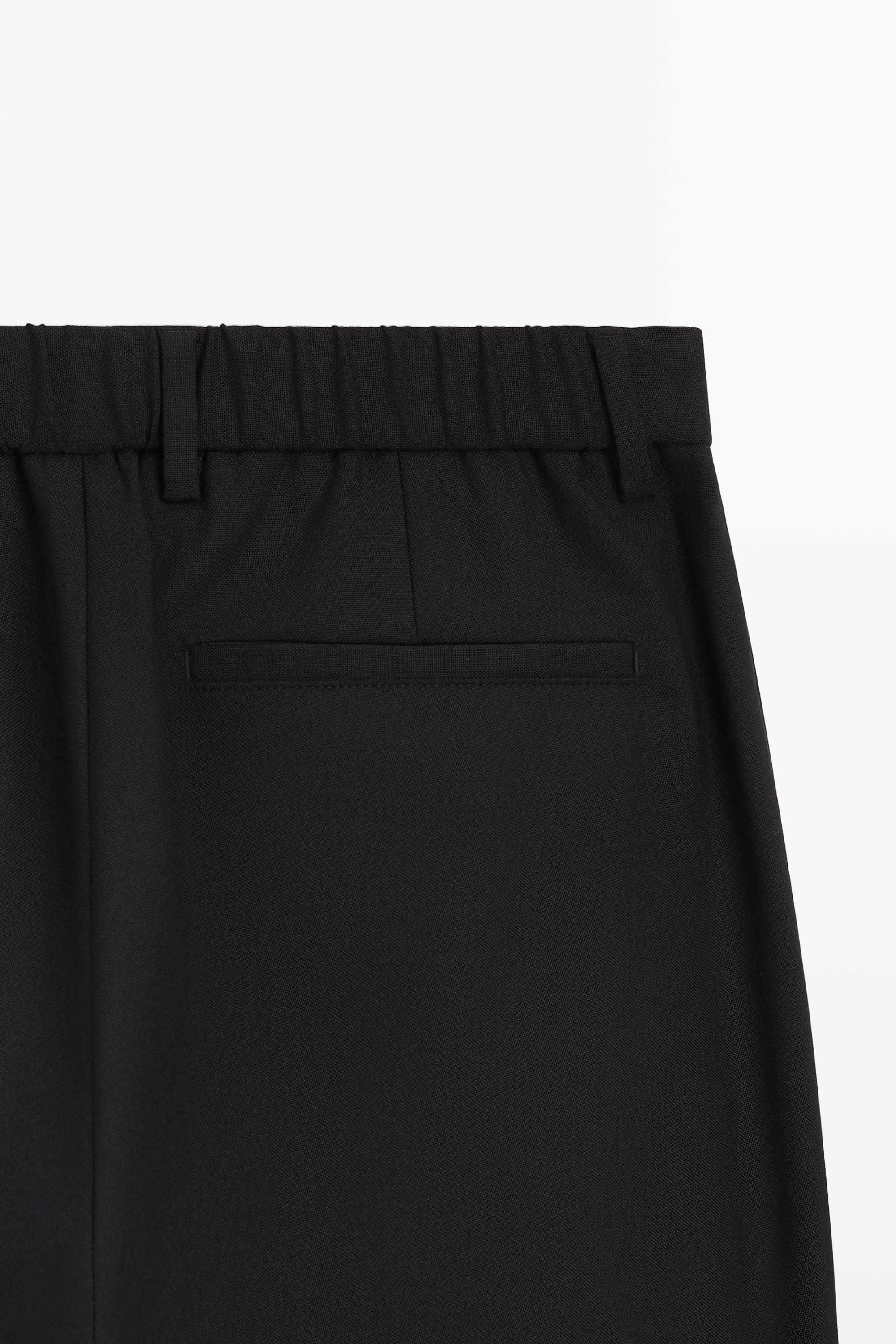 Double-pleated relaxed fit pants