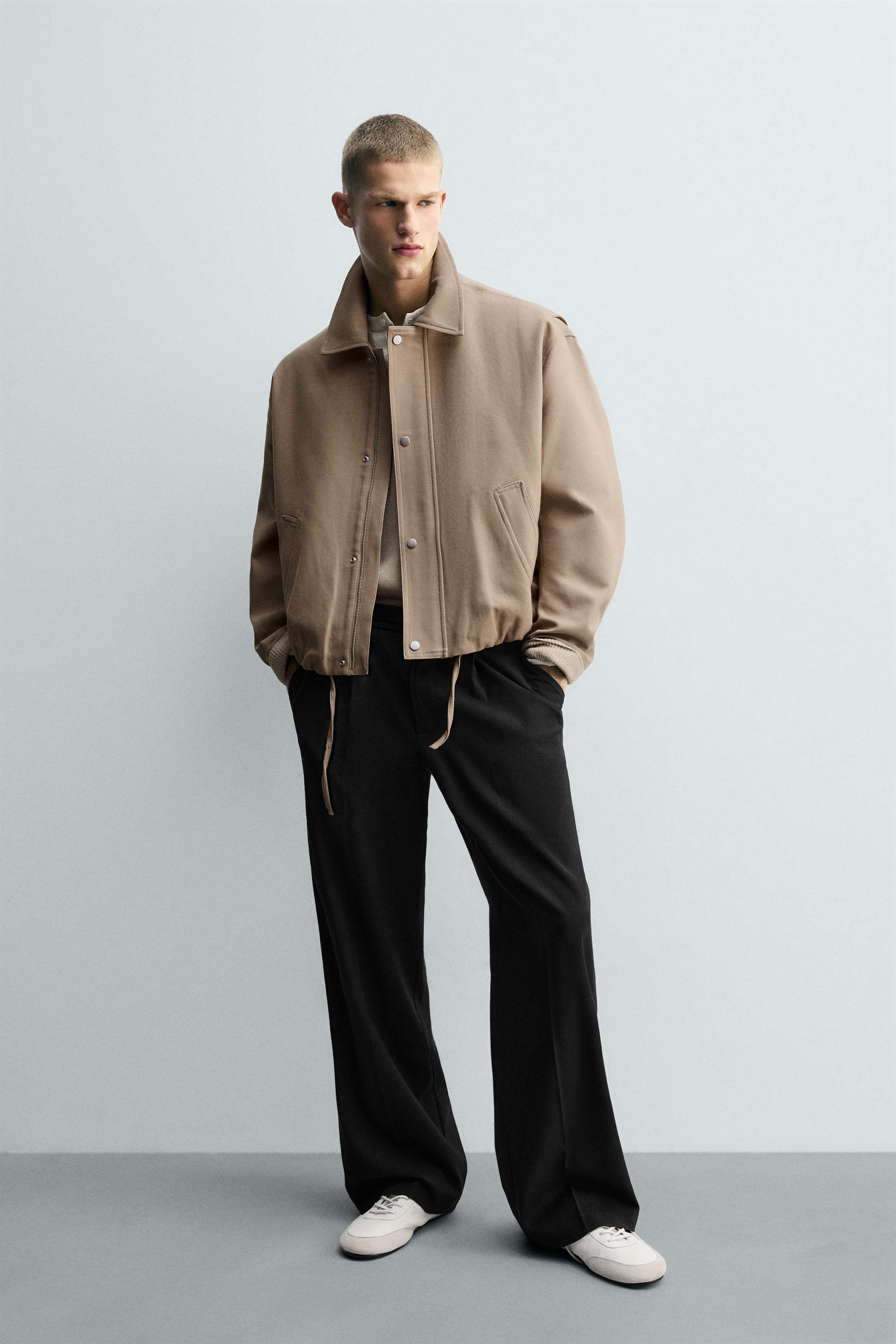 TEXTURED PLEATED PANTS