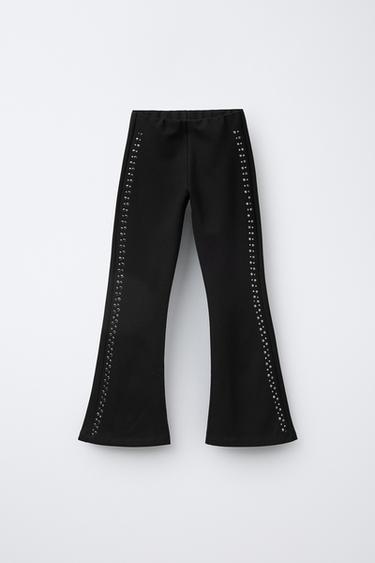 PANTALÓN PUNTO ROMA FLARE TACHAS - Negro de Zara - Imagen 0
