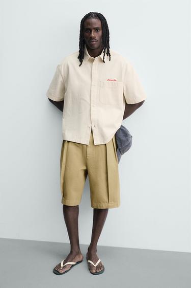 CHEMISE À CARREAUX AVEC INSCRIPTION BRODÉE - Écru de Zara - Image 5