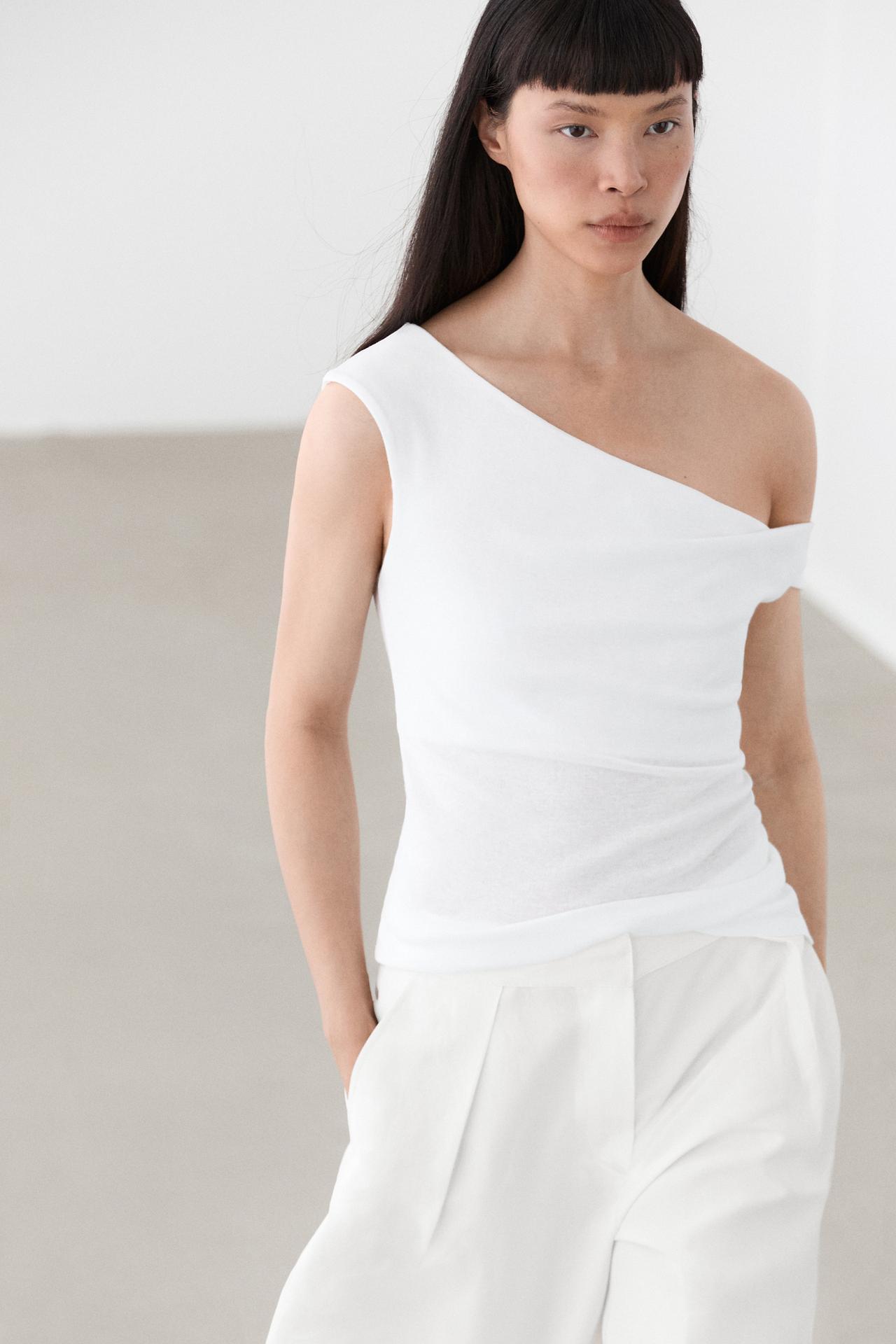 Asymmetric off-the-shoulder top — Oyster-white