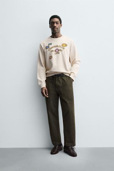 SUDADERA TEXTO BORDADO - Crudo de Zara - Imagen 0