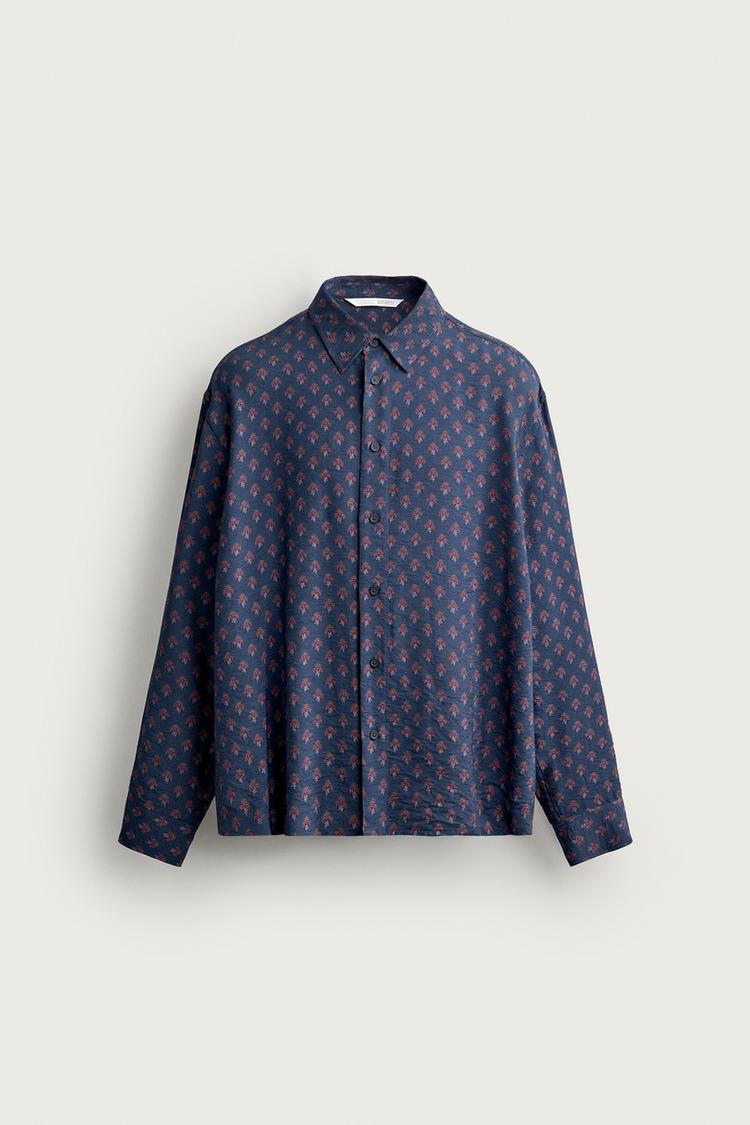 Camisa fluida estampado geometrico
