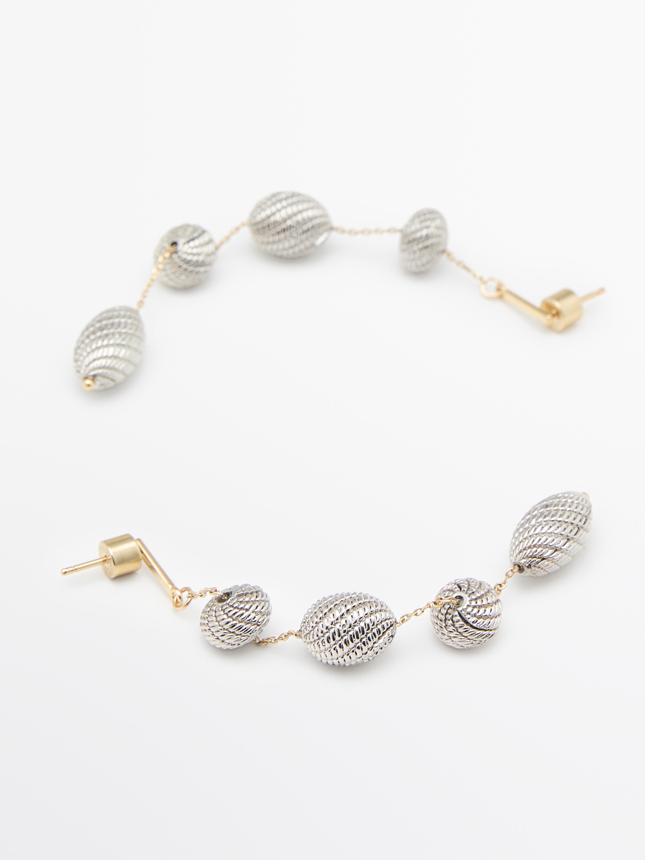 Boucles d’oreilles pendantes pièces texturées