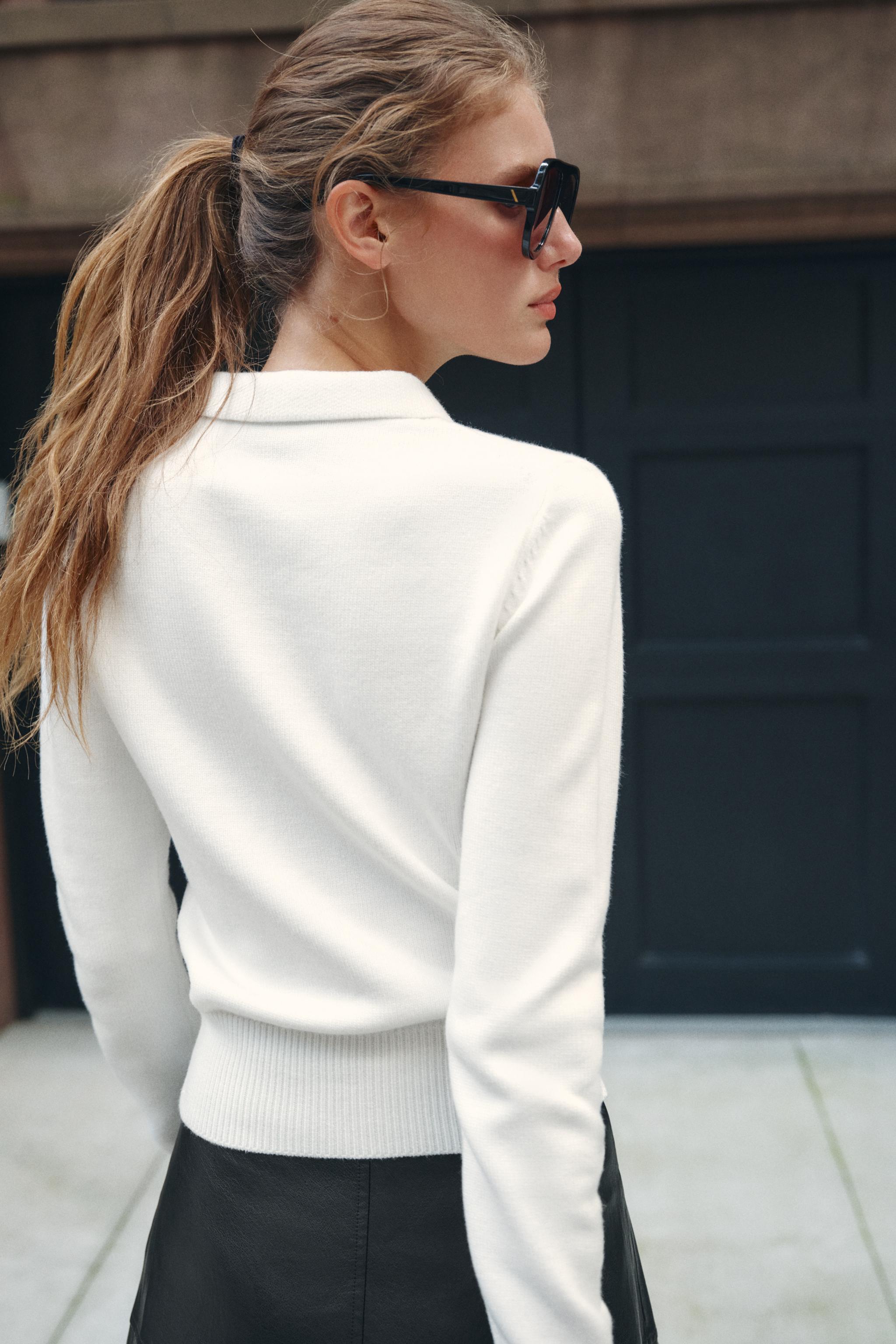 POLO EN MAILLE À ZIP