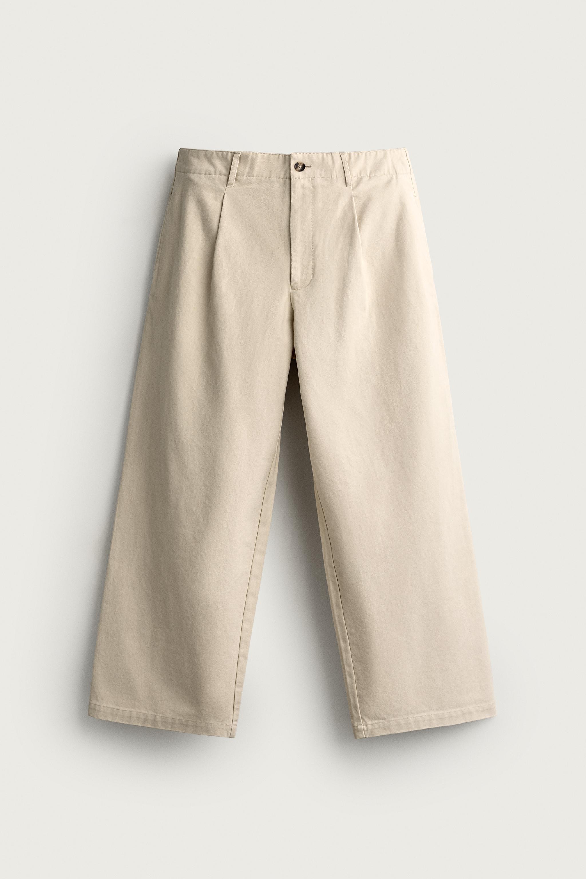 RELAXED FIT PLEATED PANTS