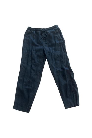Dark blue casual long pants, with an elastic waistband and adjustable drawstring, on a white background.