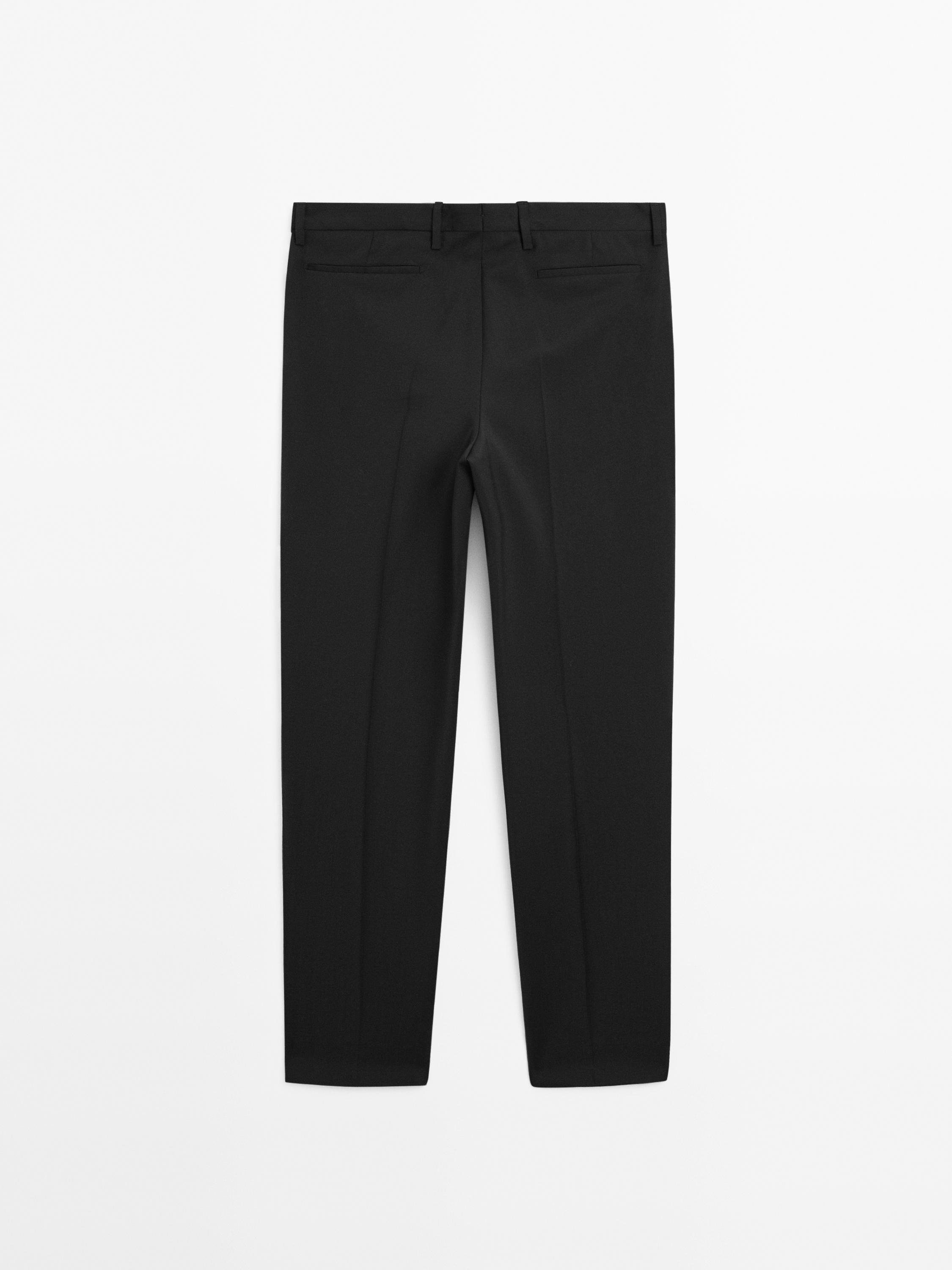 Pantalon de costume uni 100 % laine