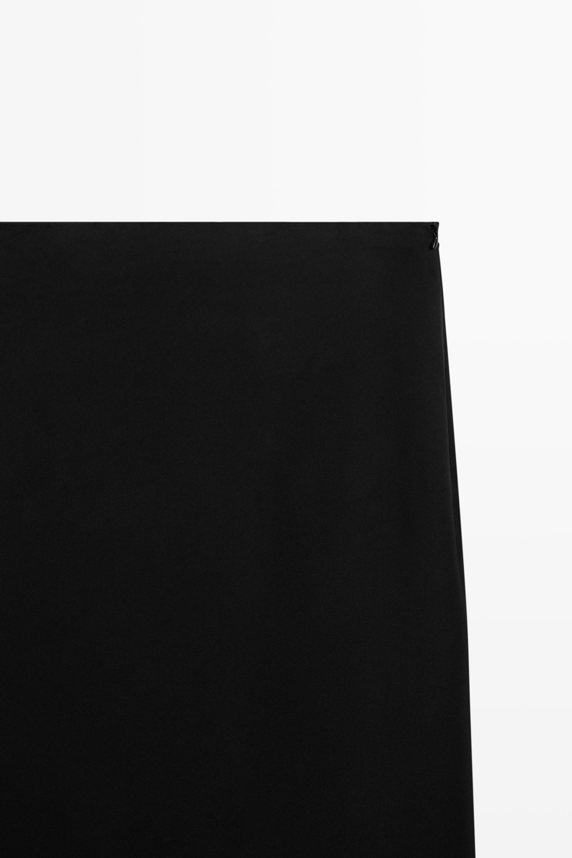 Jupe midi droite double coupe semi-transparente