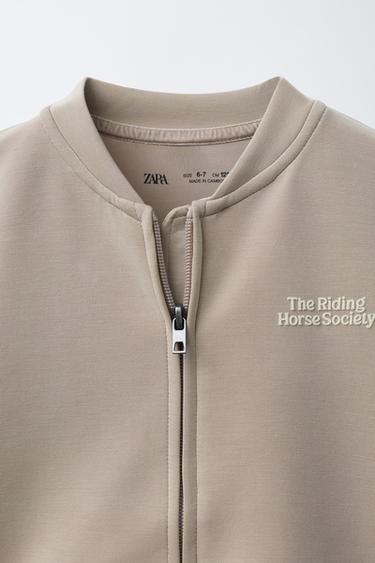 SWEATSHIRT WITH EMBOSSED SLOGAN - Stone by Zara - Image 2