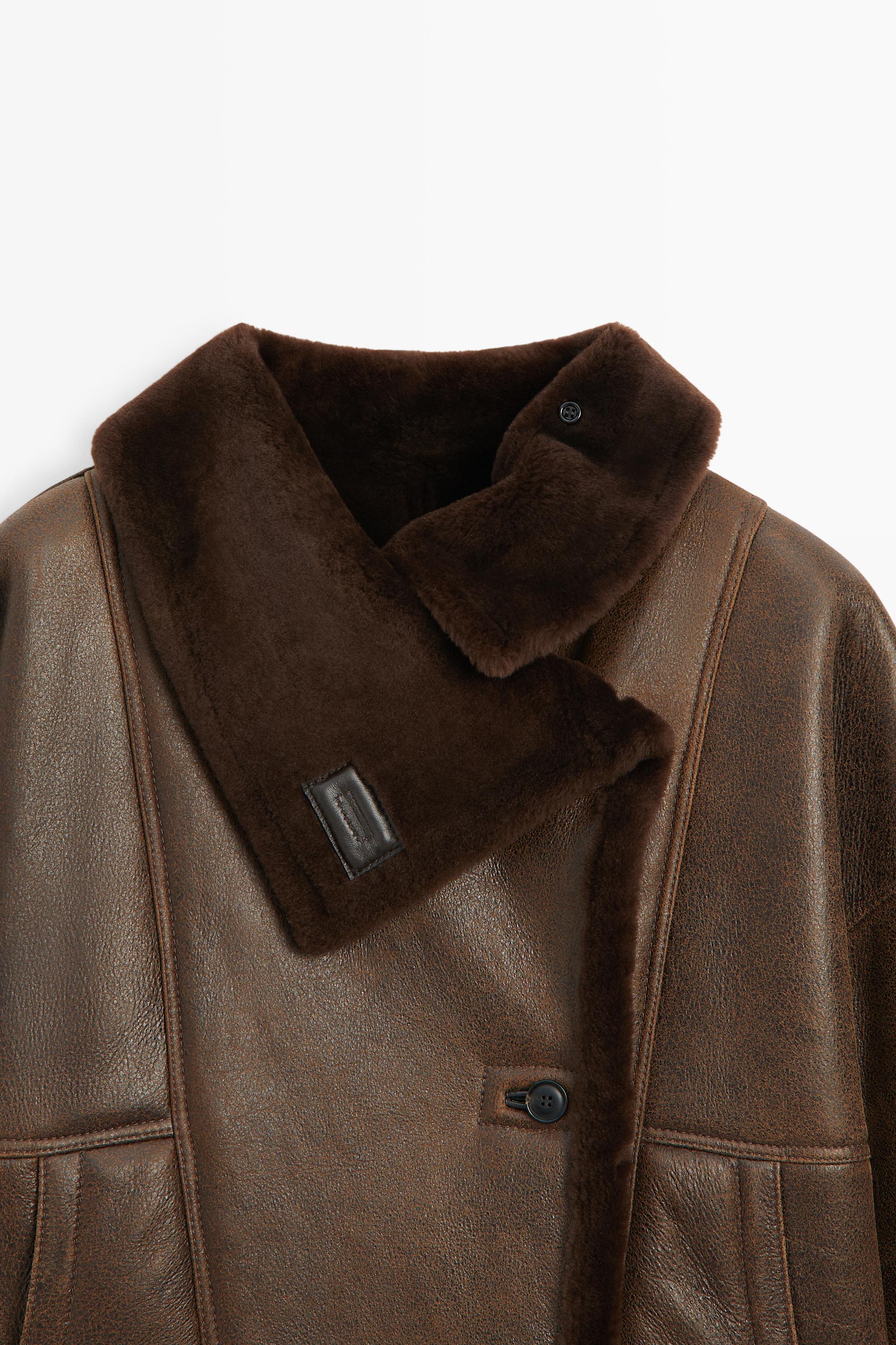 Manteau double face en cuir, daim et fourrure