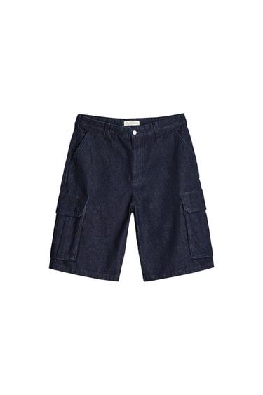 Dark blue denim shorts with large side pockets and button fastening, on a white background.