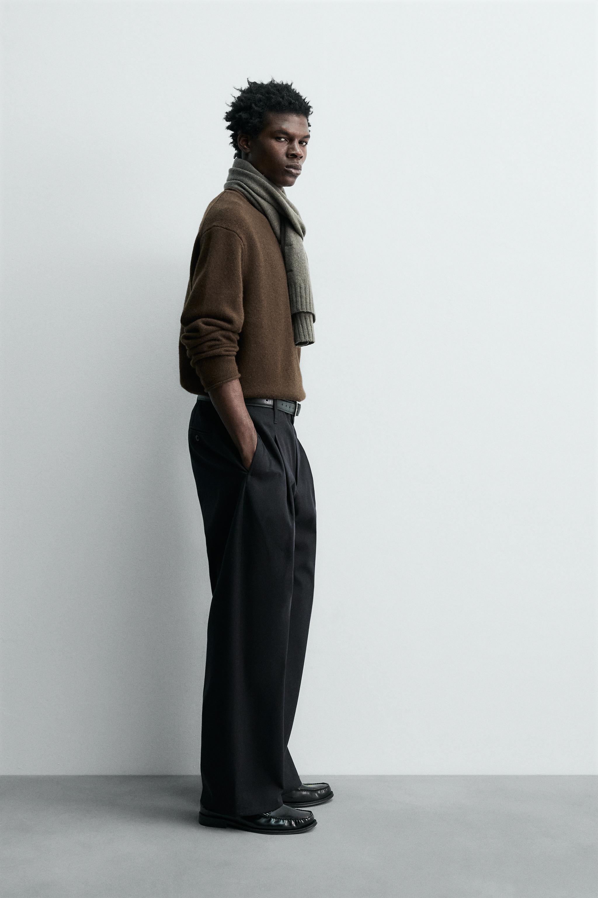 100% WOOL ROLLED-EDGE SWEATER