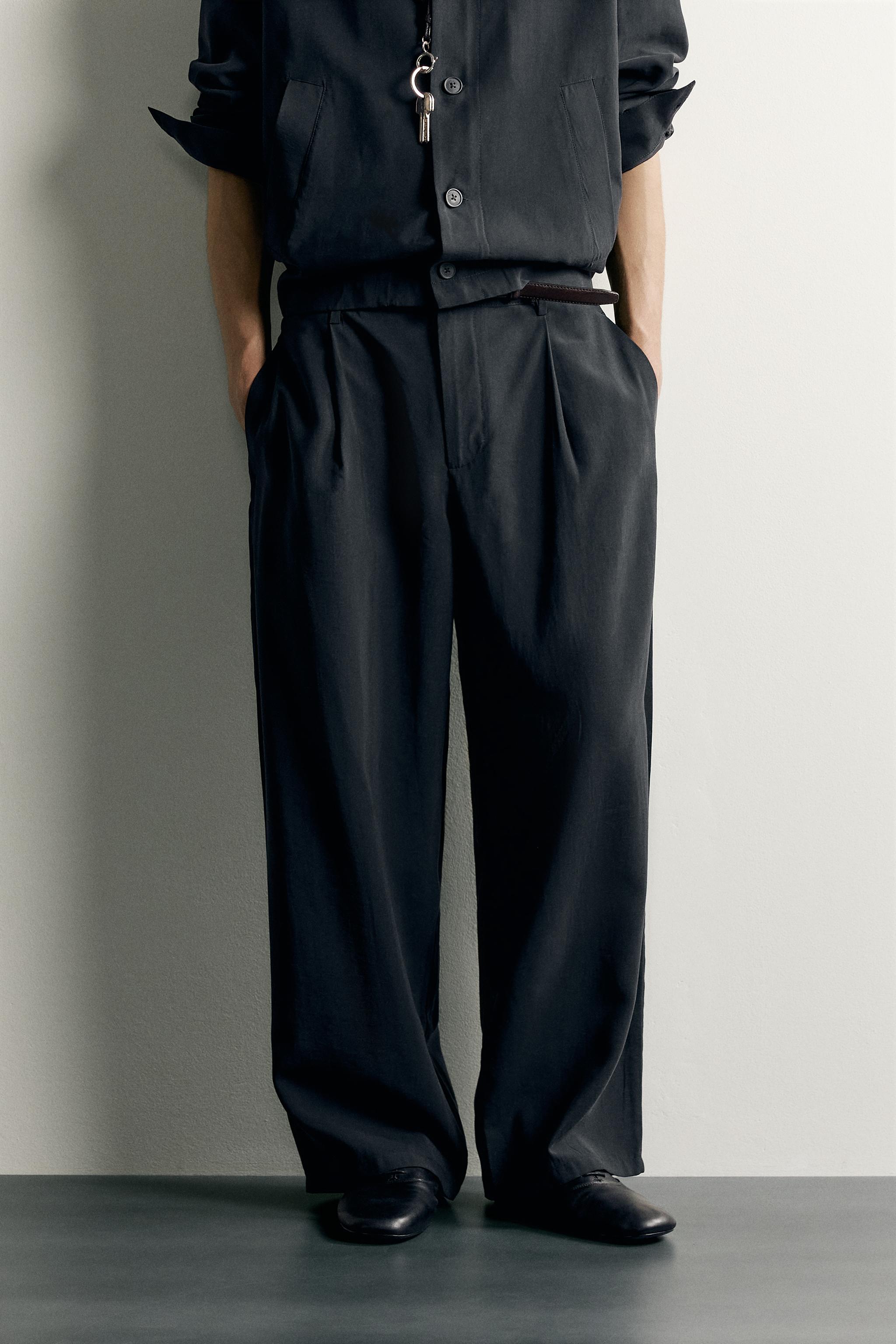 Relaxed-Fit Pleated Fluid Trousers — Black