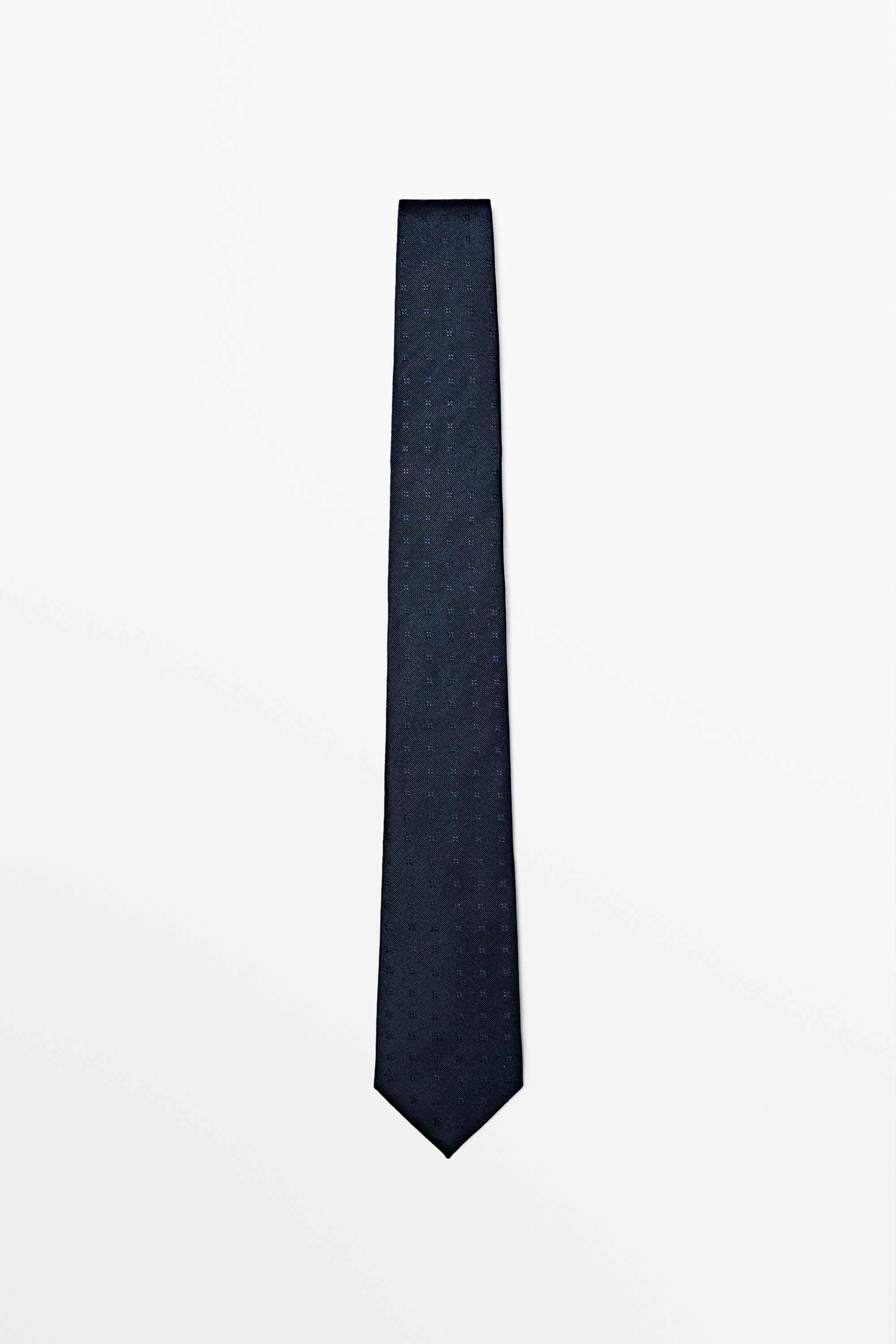 100% silk tie with embroidered detail — Navy blue