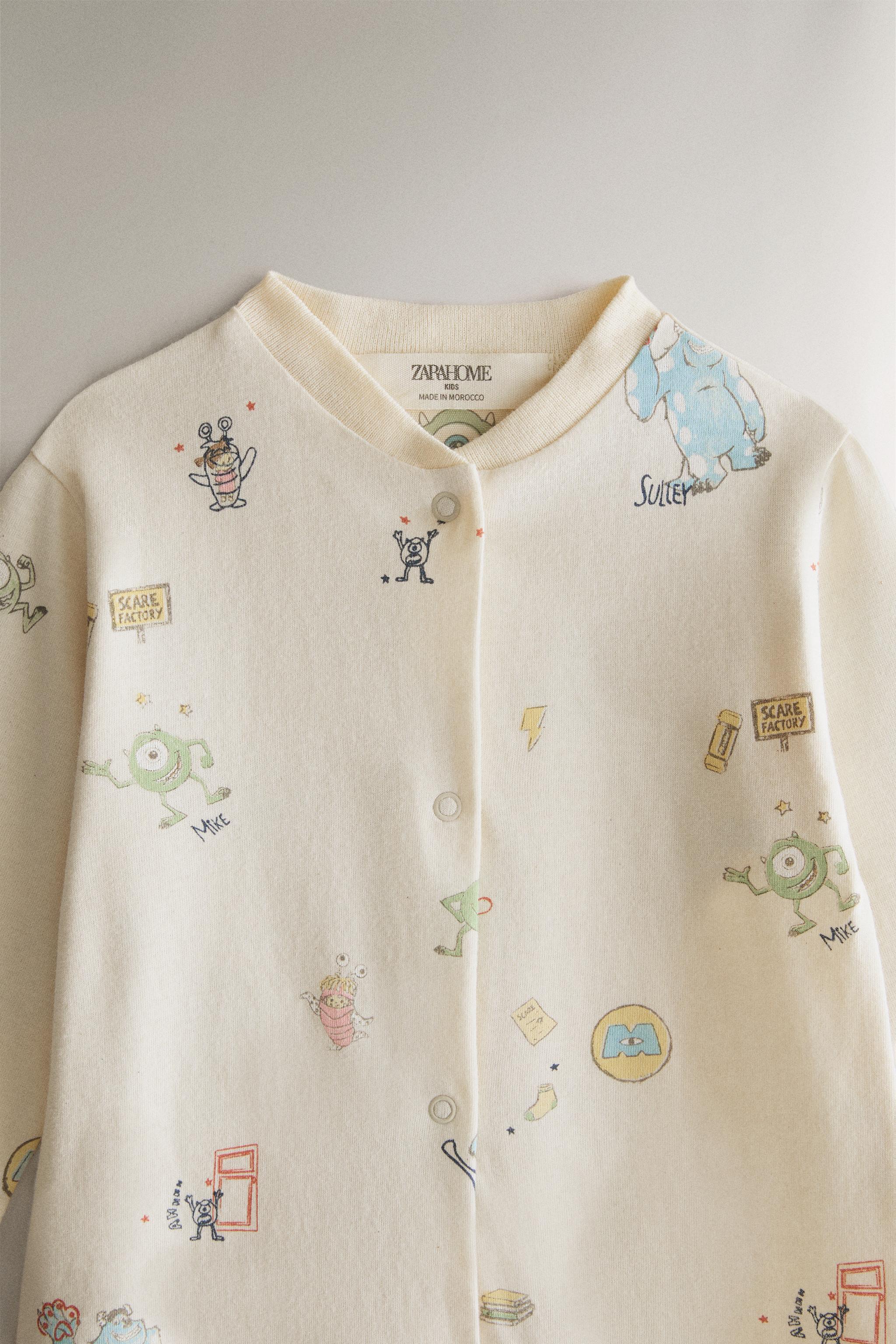 BABY MONSTERS, INC. ©DISNEY/PIXAR FOOTED ROMPER — Light beige