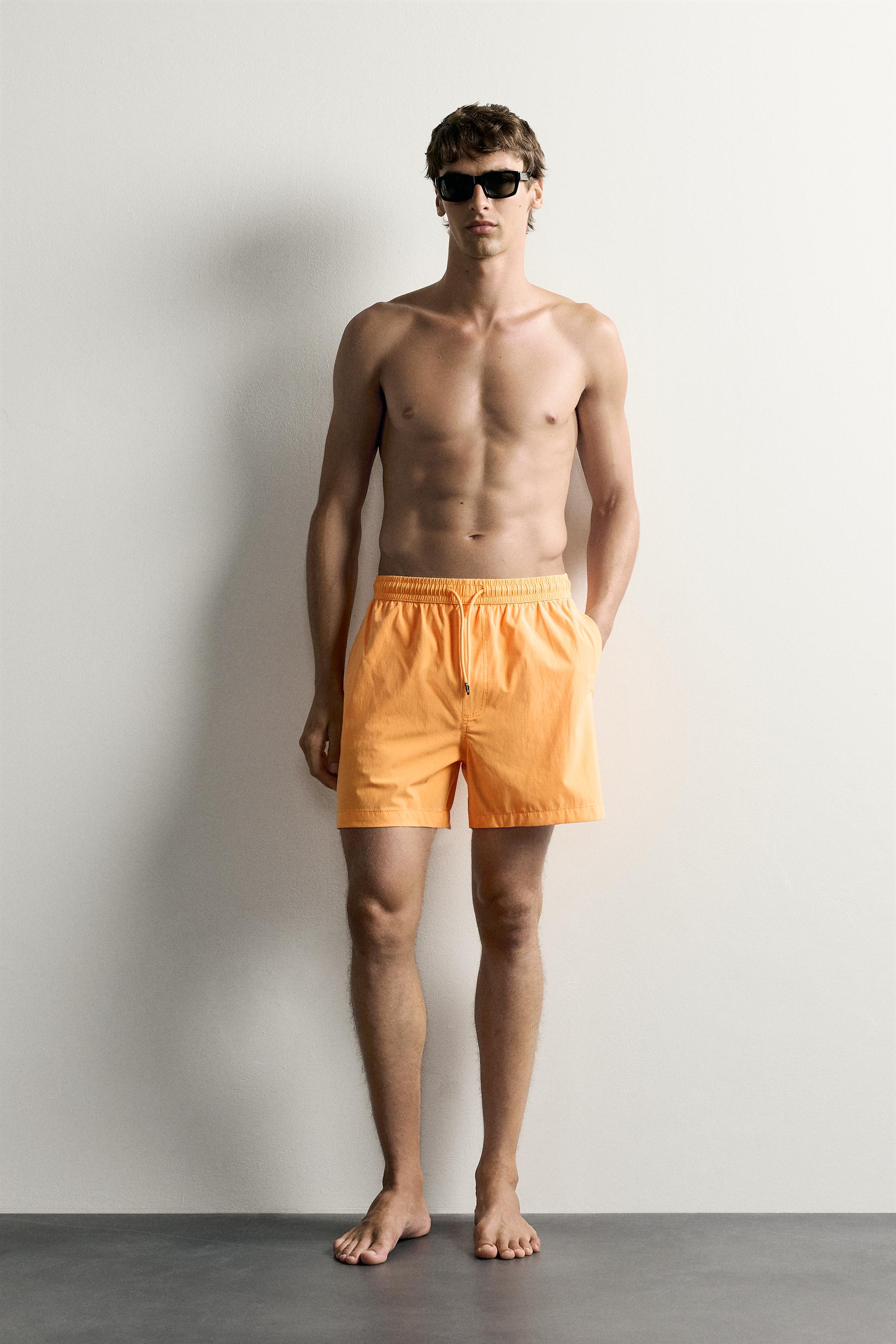 WASHED EFFECT LONG SWIM TRUNKS — Tangerine