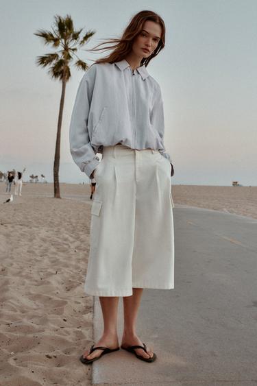 Zara BOMBER JAKNA S PUF RUKAVIMA – plavo nebo