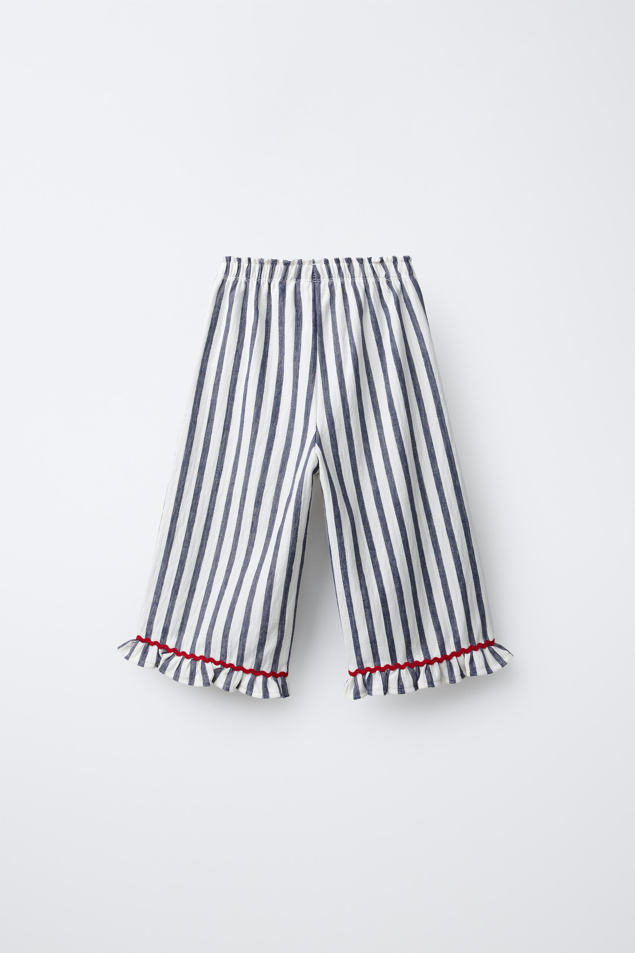 PANTALON À RAYURES TISSÉES ET VOLANTS
