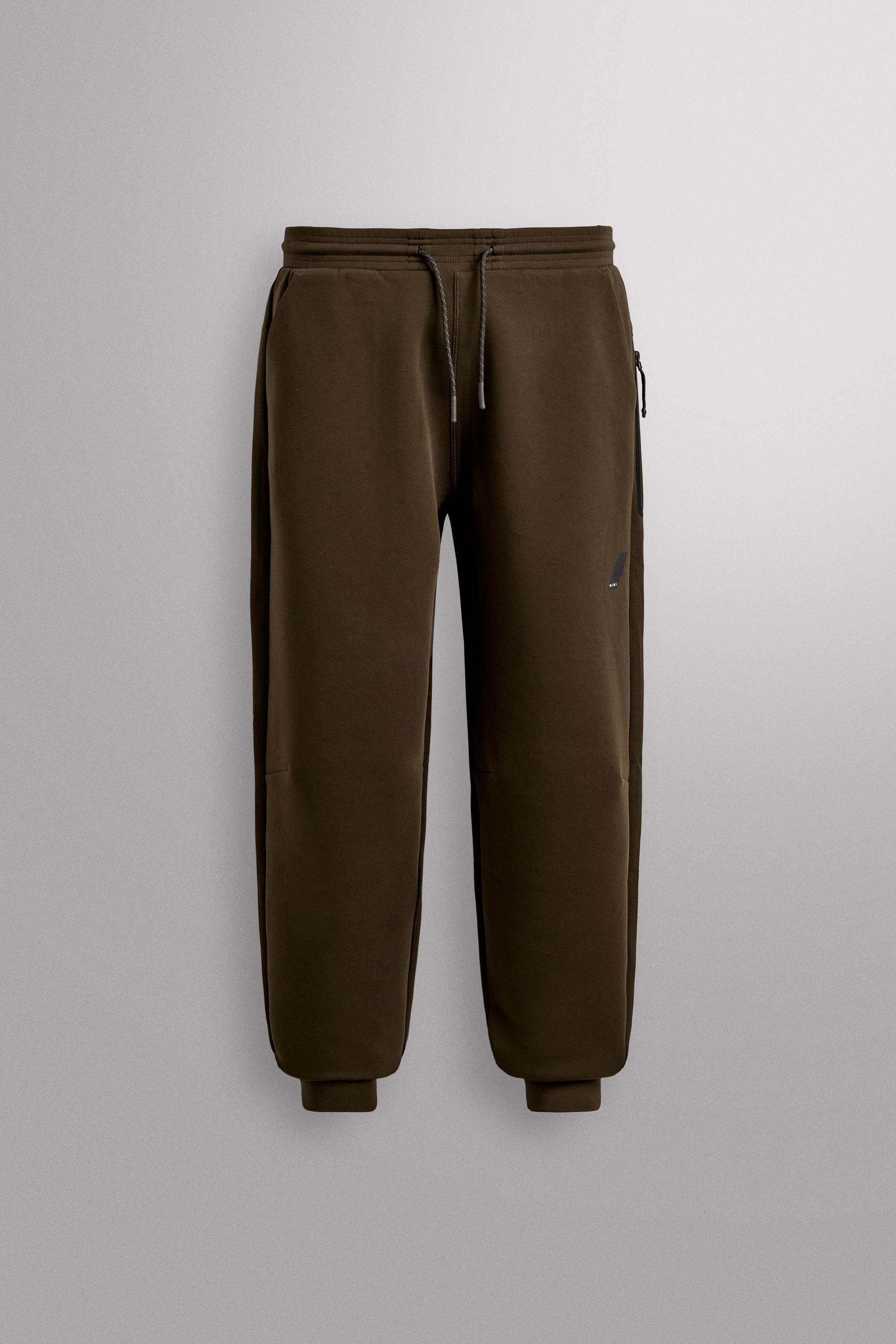 PANTALON TECHNIQUE À FERMETURE ÉCLAIR