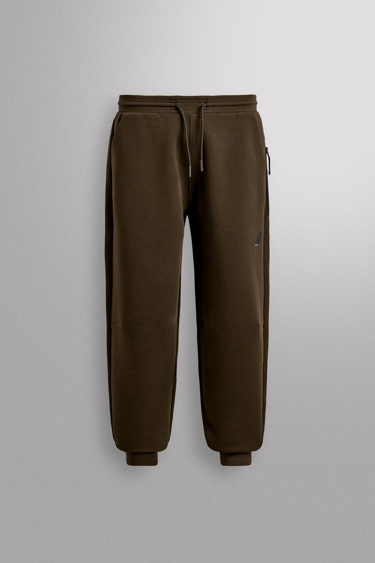 ZARA TECHNICAL TROUSERS WITH ZIPS