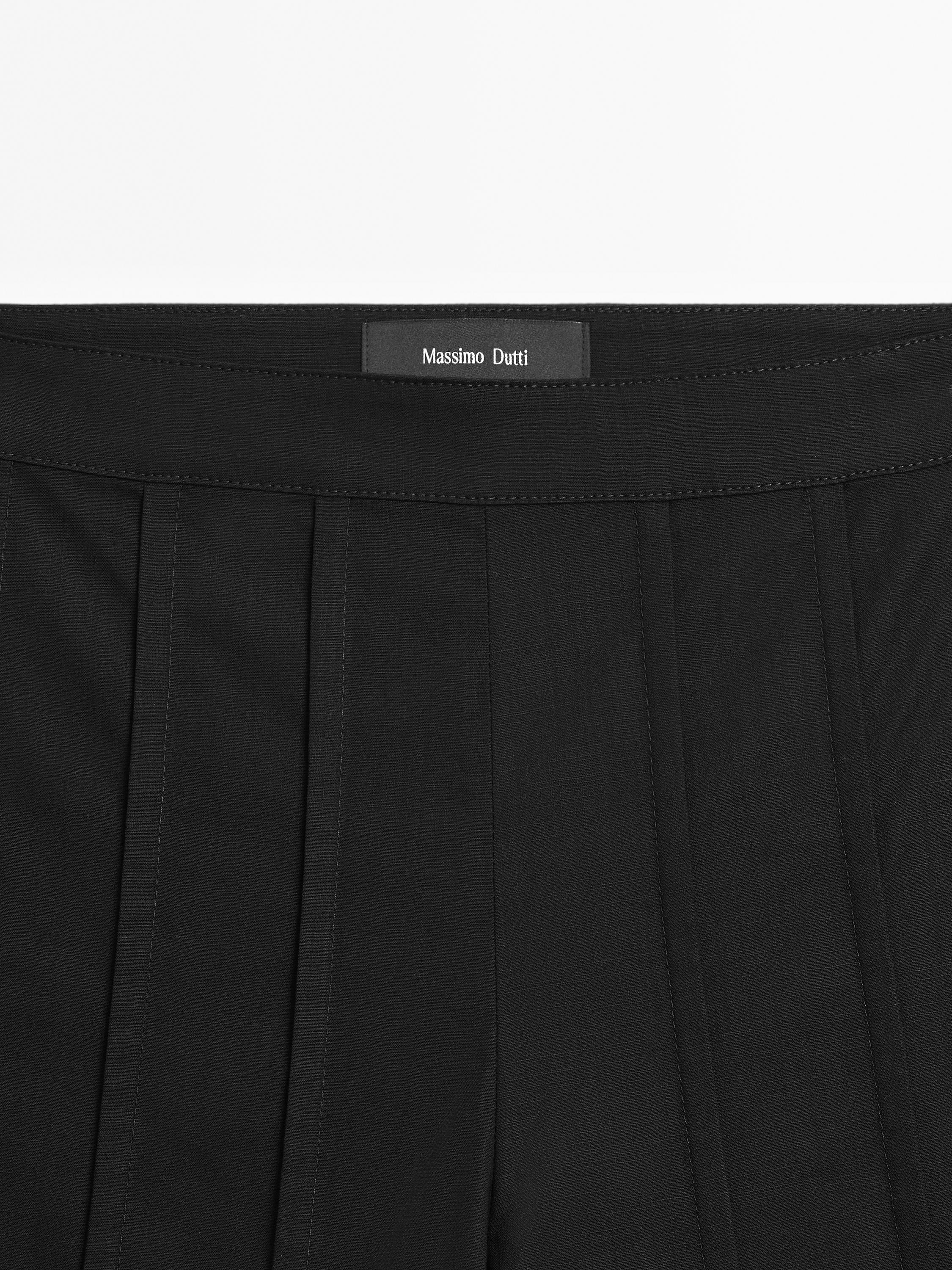 Pantalon large coutures apparentes