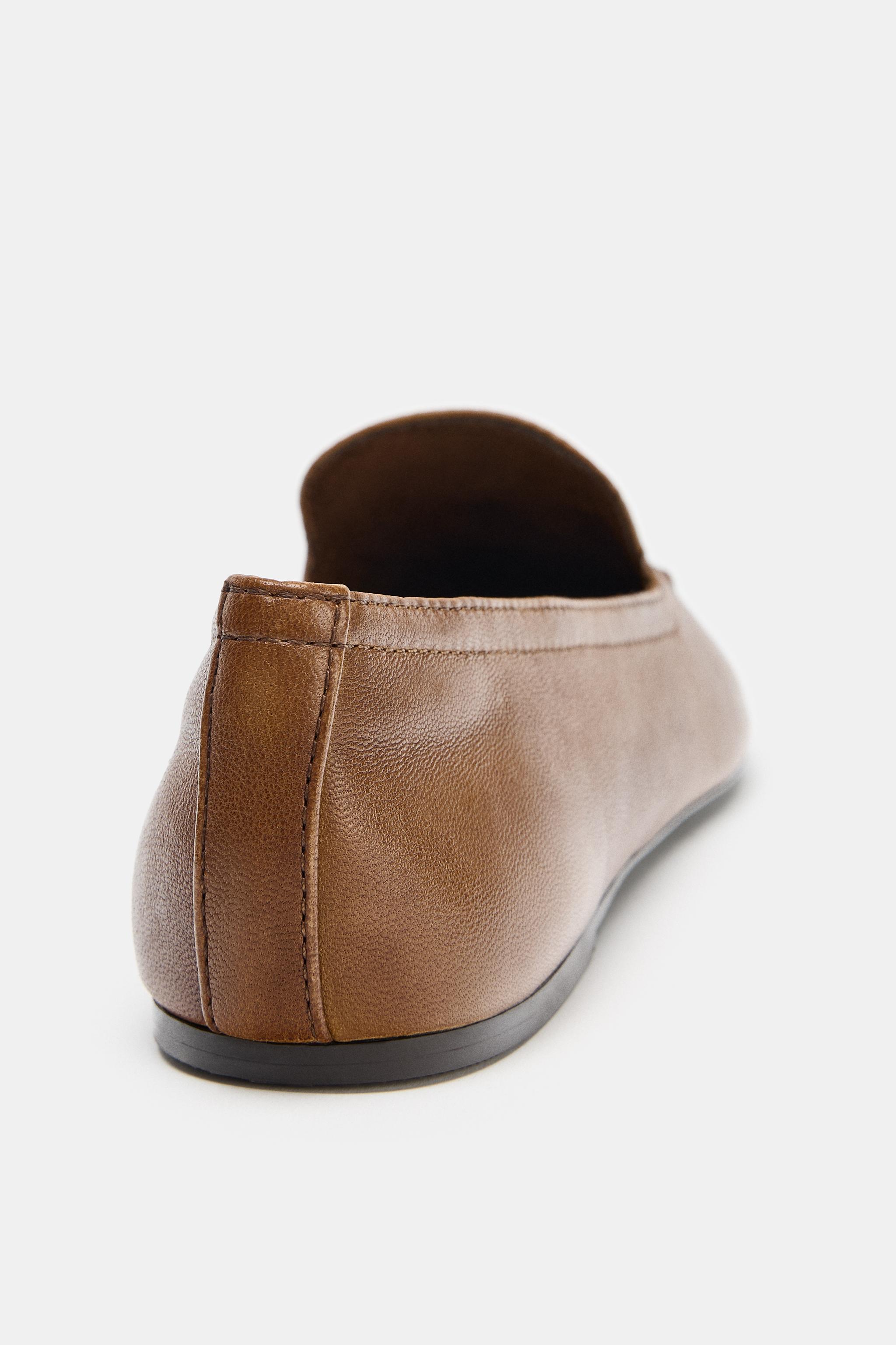 MOCASSINS EN CUIR À TIGE HAUTE