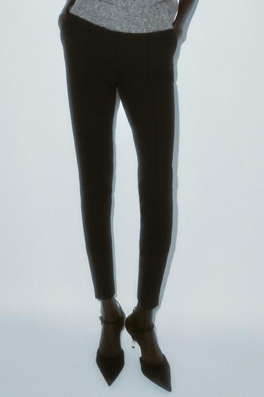 HIGH-WAIST SLIM FIT TROUSERS WITH ZIPPED HEM - Black by Zara