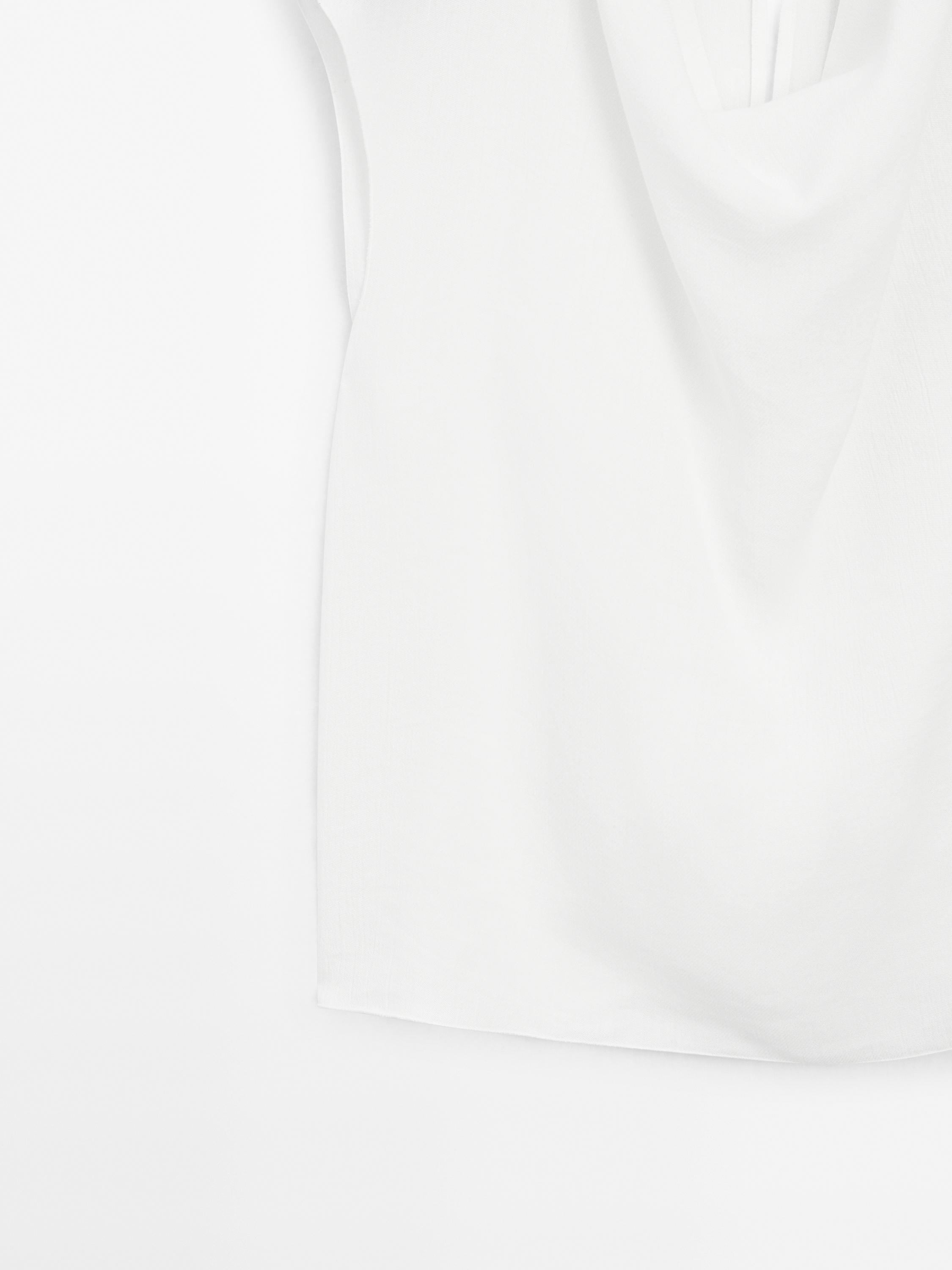 Flowing blouse with draped collar