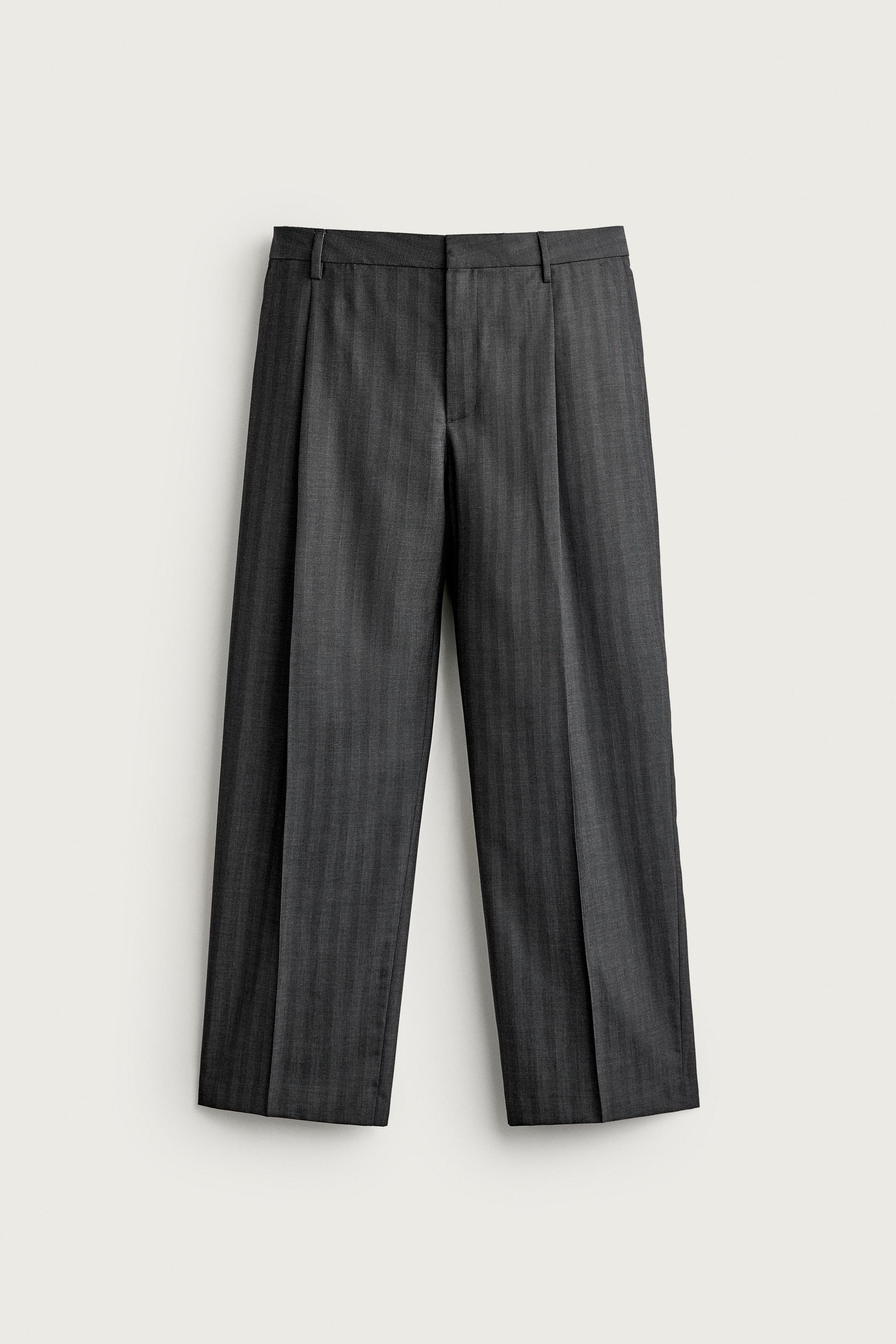 STRIPED PLEATED RELAXED FIT PANTS