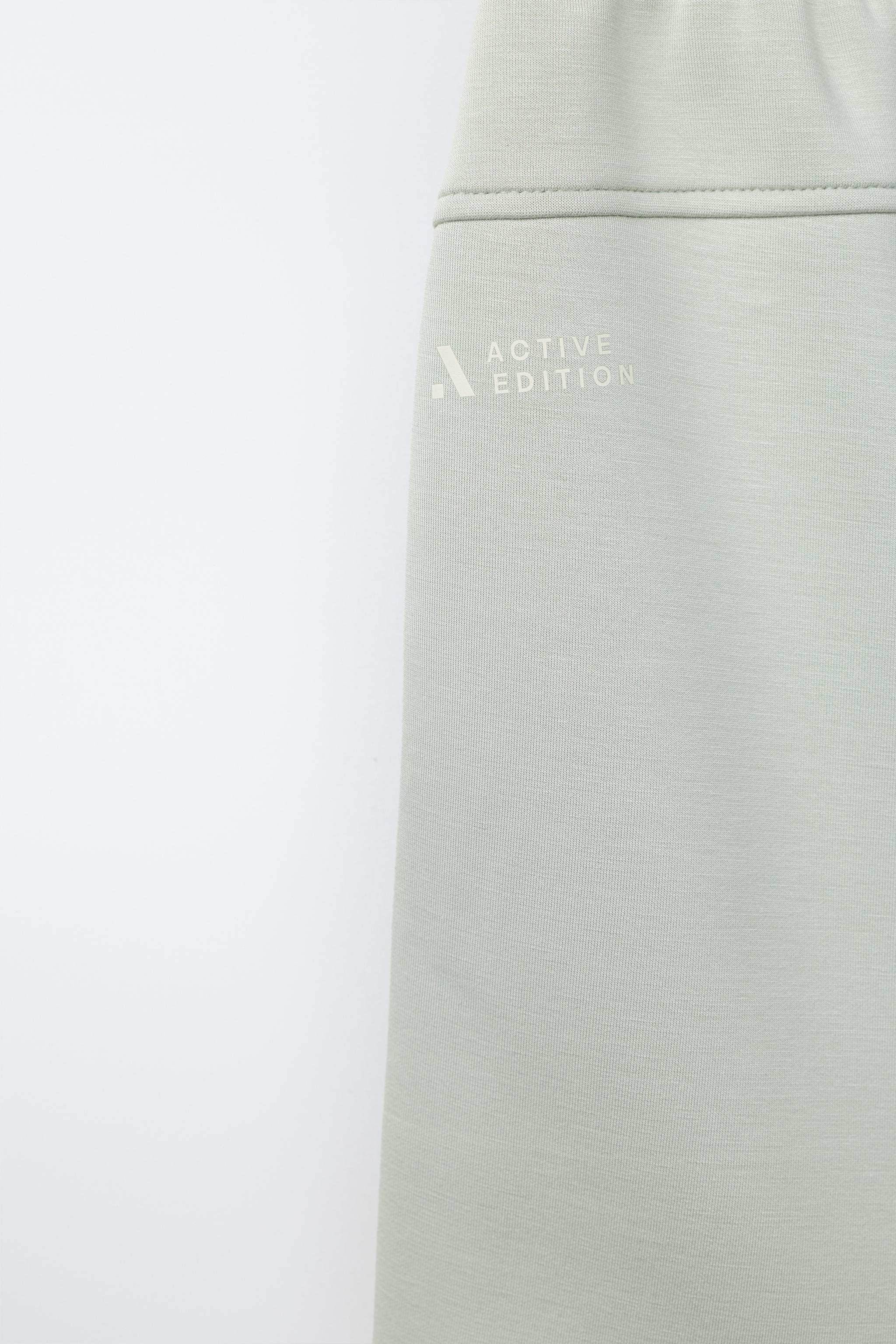PIPED ATHLETIC SHORTS — Light mint green