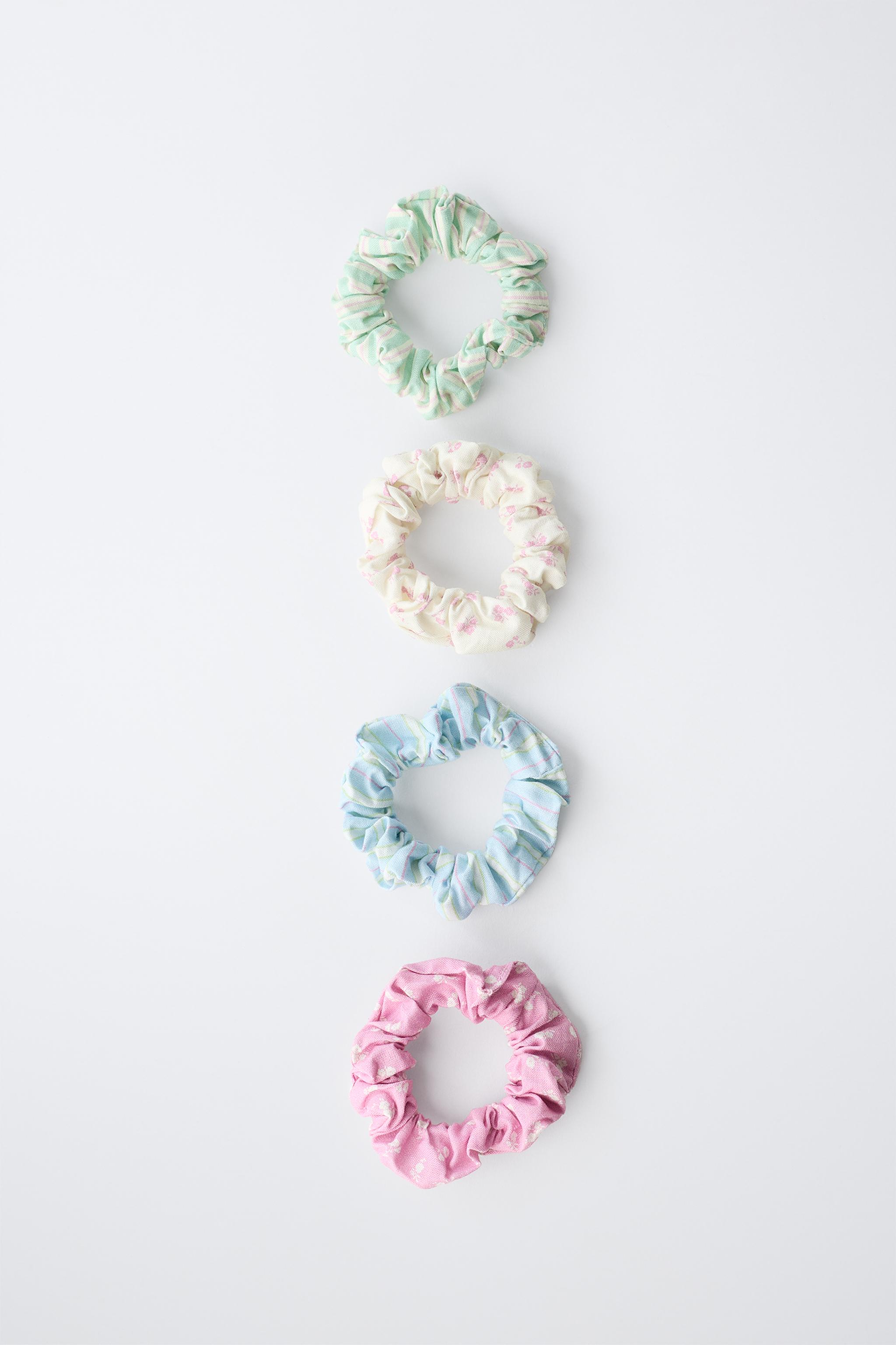FOUR-PACK OF STRIPED AND FLORAL SCRUNCHIES