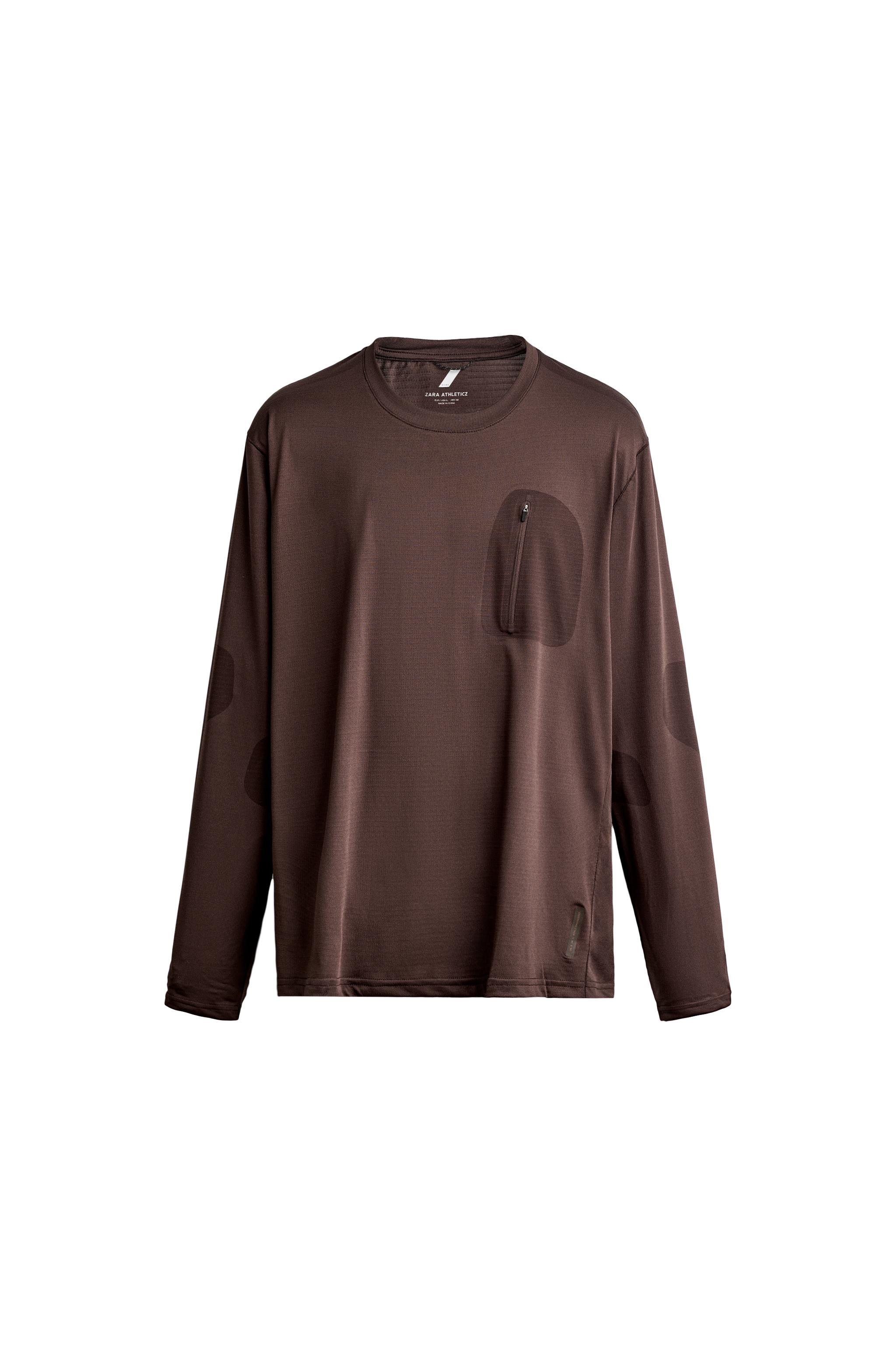 CAMISETA TÉCNICA MANGA LARGA BOLSILLO