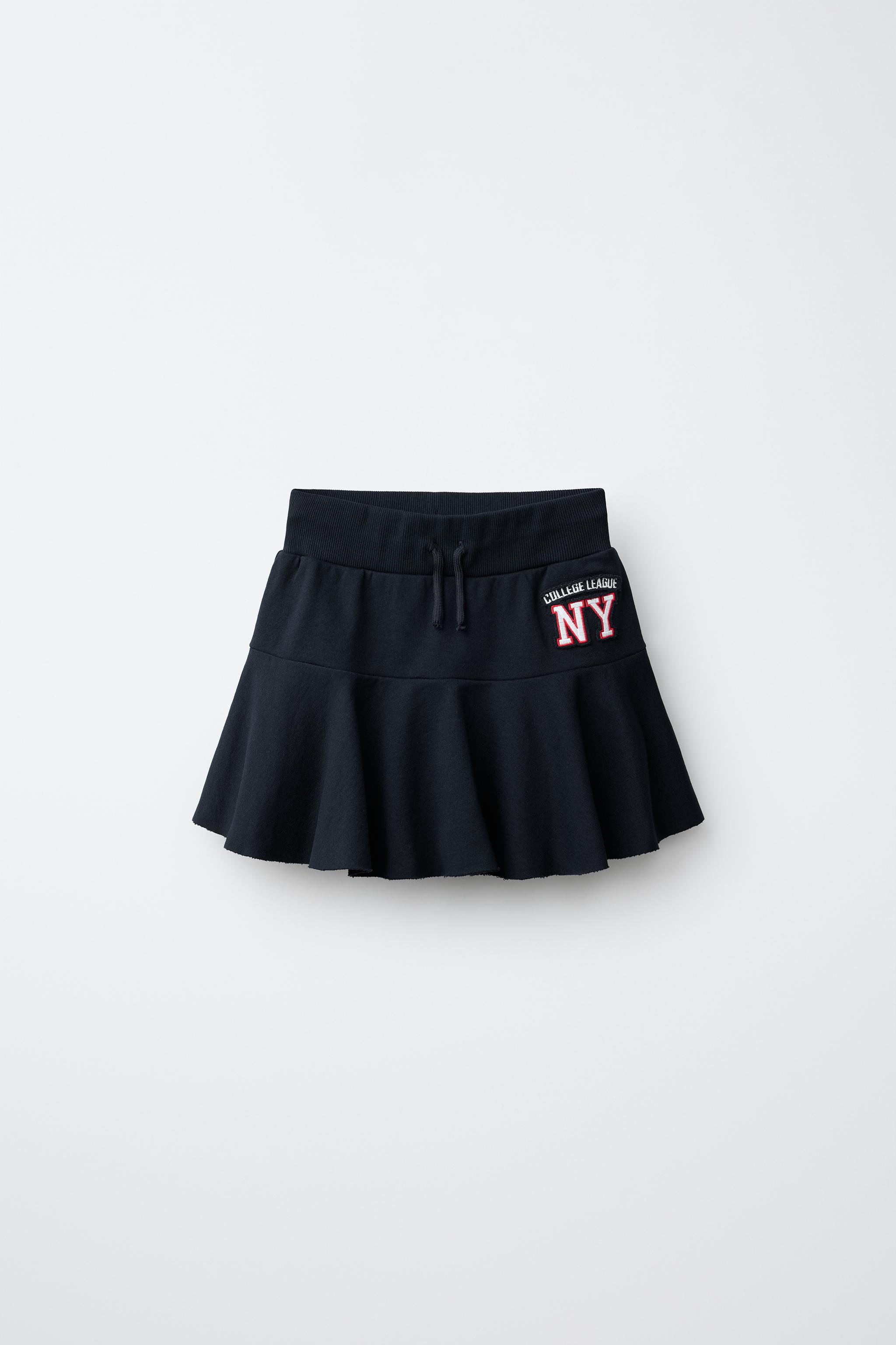 NY EMBROIDERED RUFFLE SKORT