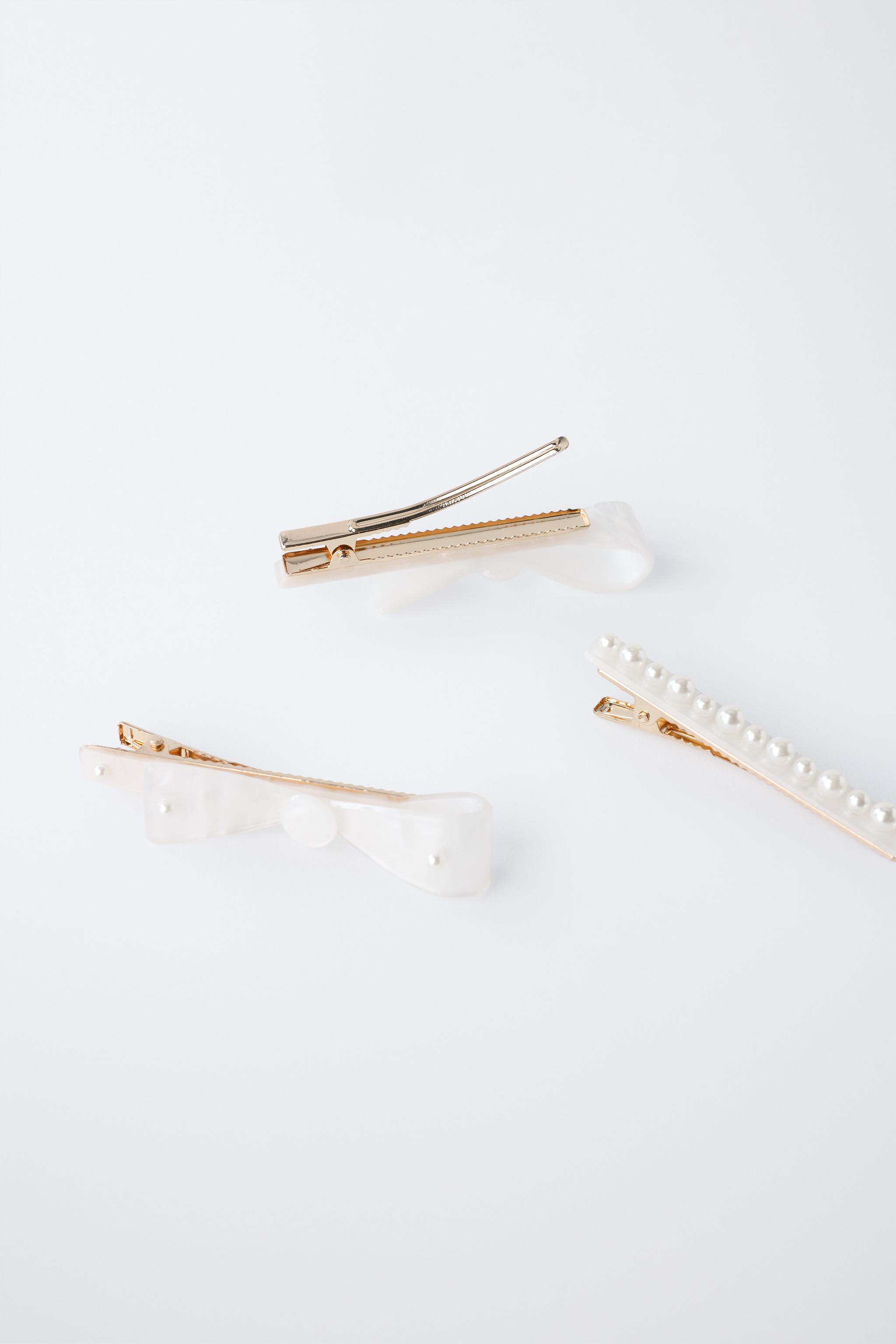 PACK OF THREE MOTHER-OF-PEARL HAIR CLIPS WITH BOWS AND PEARLS